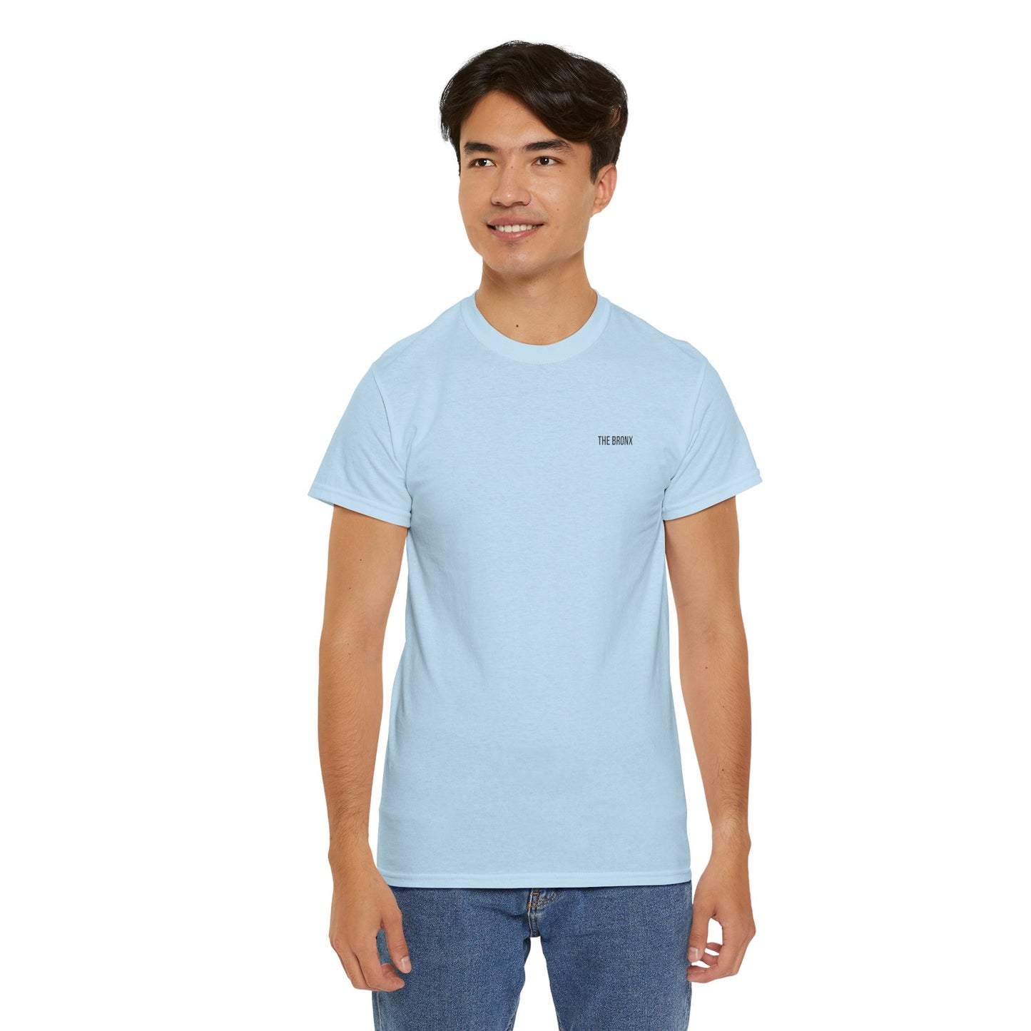 Male model wearing The Bronx T-Shirt in light blue, front view