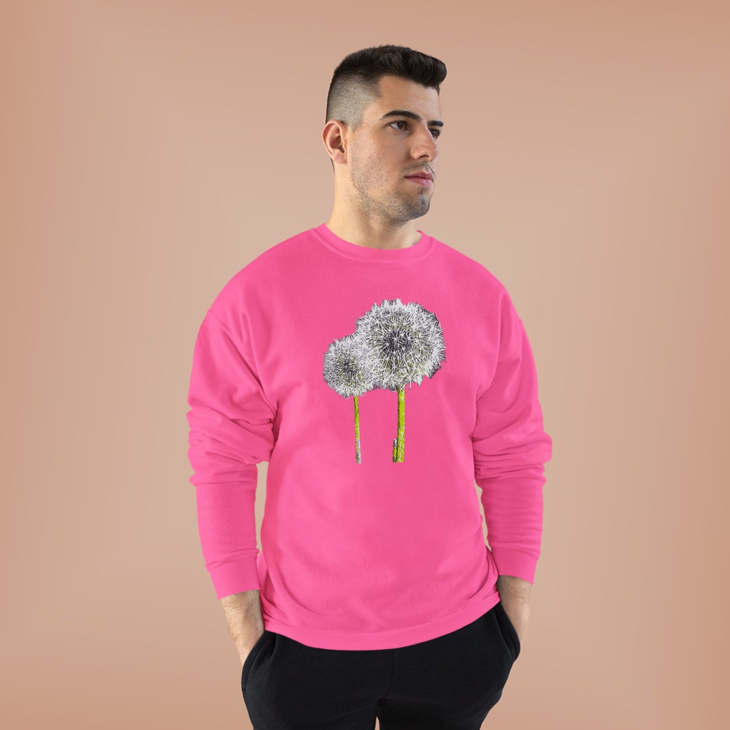 Man in pink Tantrum Media Dandelion Unisex Sweatshirt with white dandelion print, peach background