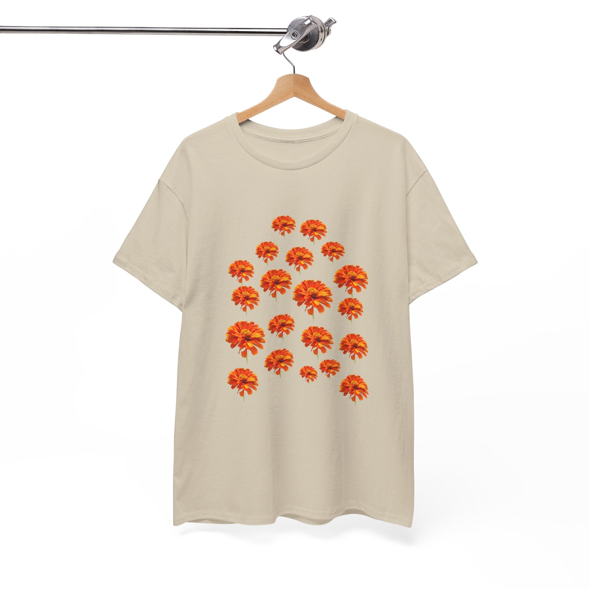 Beige Zinnia T-Shirt with orange flower design displayed on hanger front view