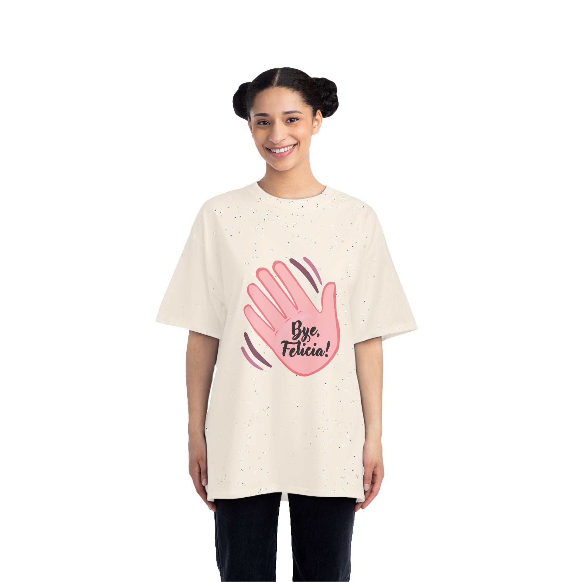 Woman wearing cream Bye Felicia T-Shirt with pink hand graphic