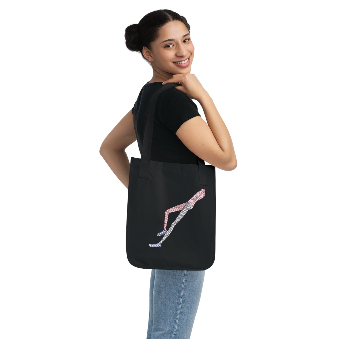 Woman holding Shapes in Shapes Organic Tote Bag in black