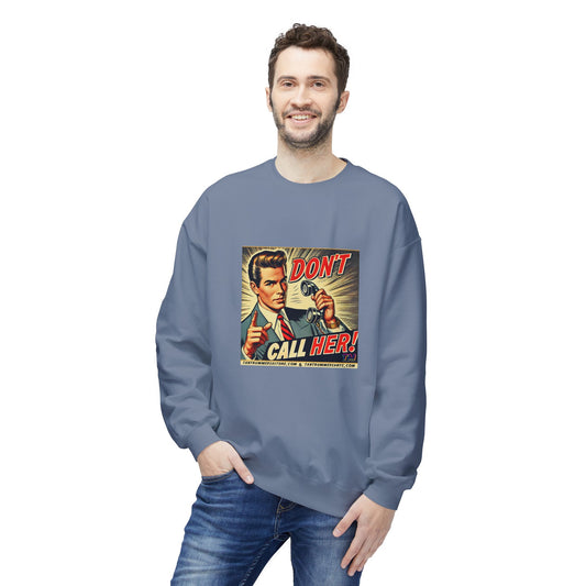 Model wearing a blue unisex sweatshirt with retro pop art graphic that says “DON’T CALL HER!”