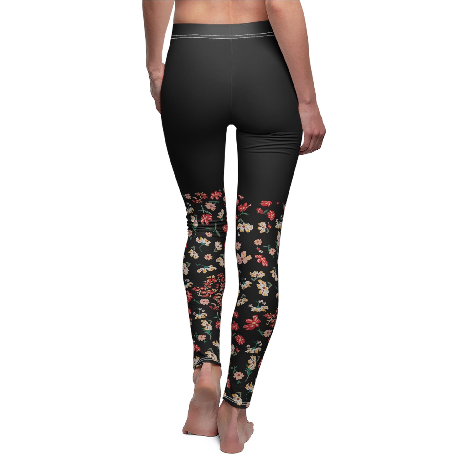 Black leggings with floral pattern on a white background
