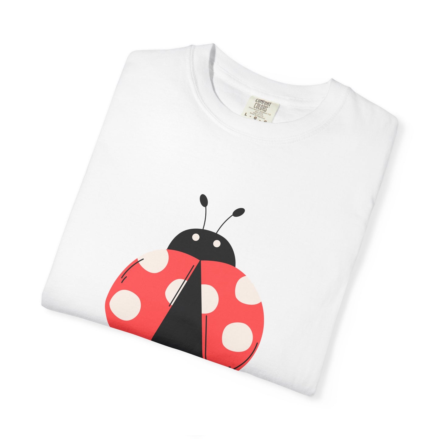 Folded white Lady Bug T-Shirt with lady bug graphic visible.