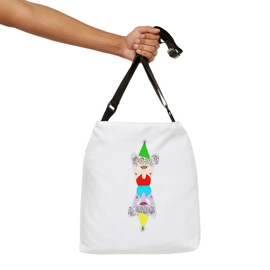 White tote bag featuring a mirrored colorful cartoon character design held by a hand
