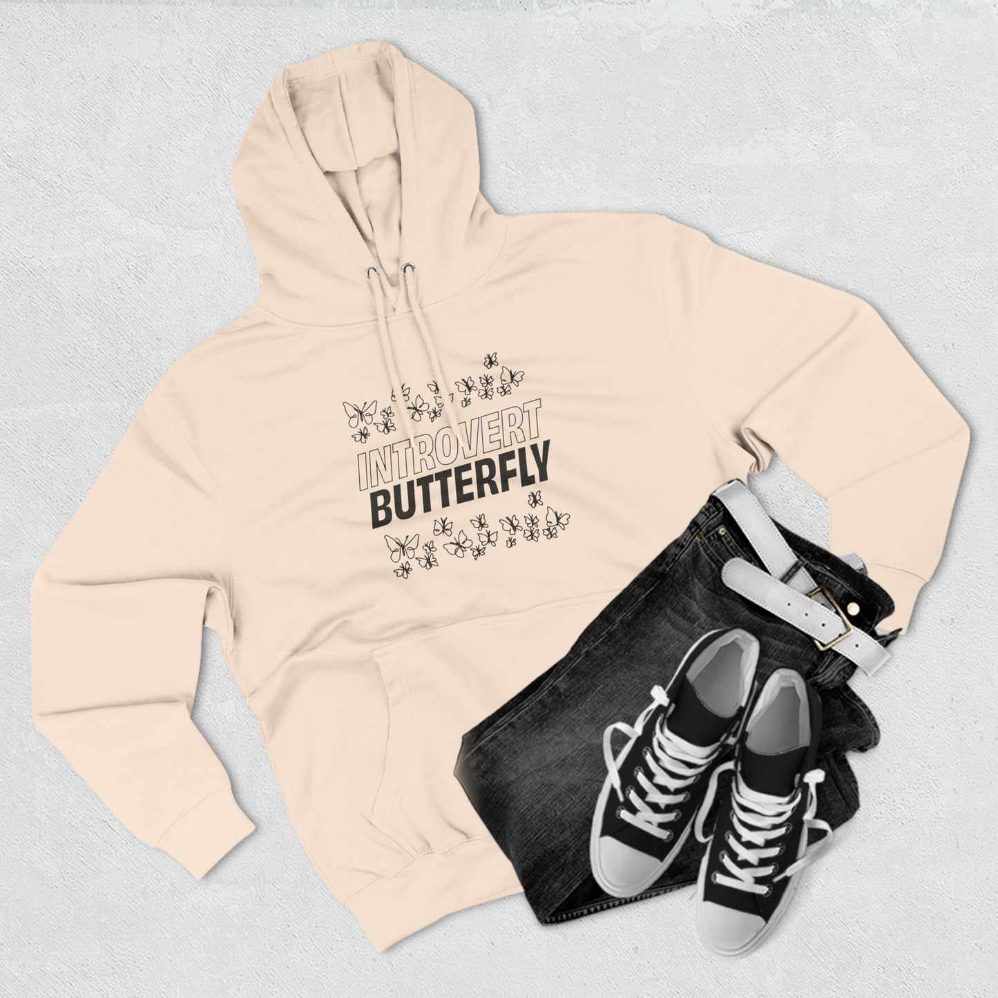 beige introvert butterfly hoodie folded outfit styling
