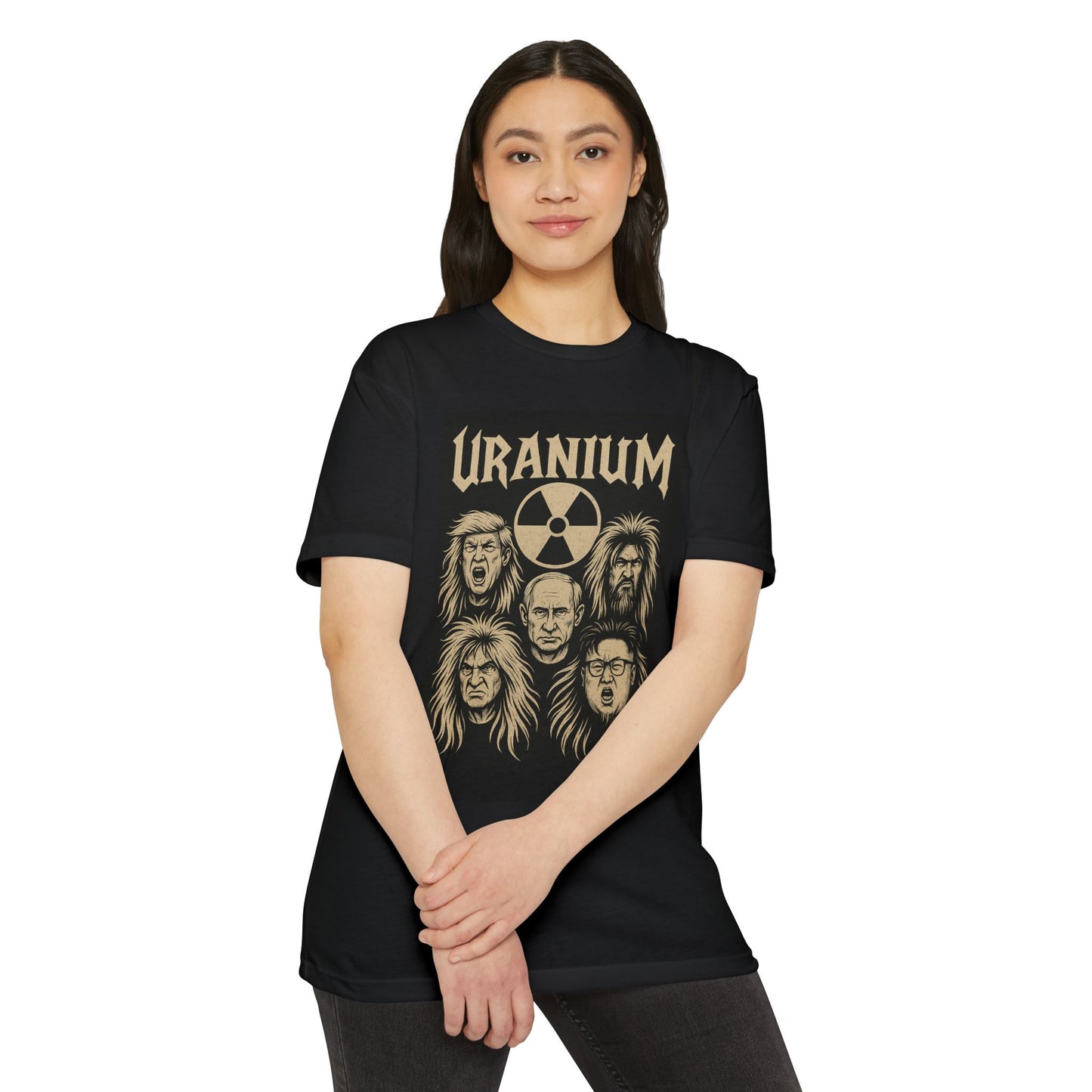 Female model wearing the Uranium T-shirt featuring world leader caricatures, hands clasped in front.