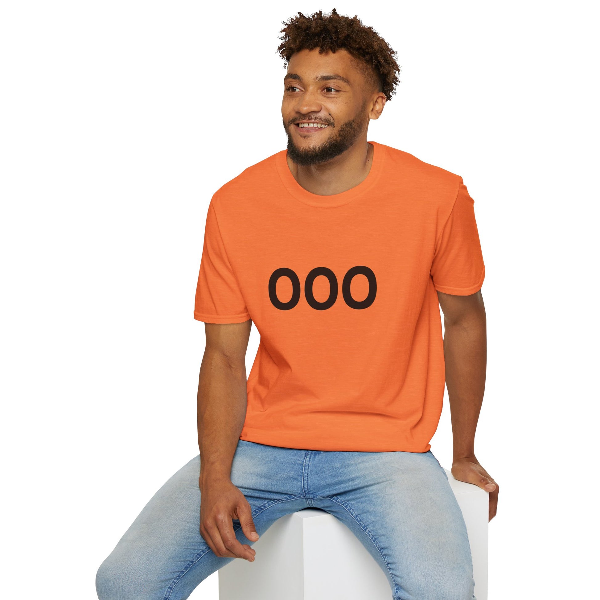 Man smiling in orange OOO Out of Office T-shirt