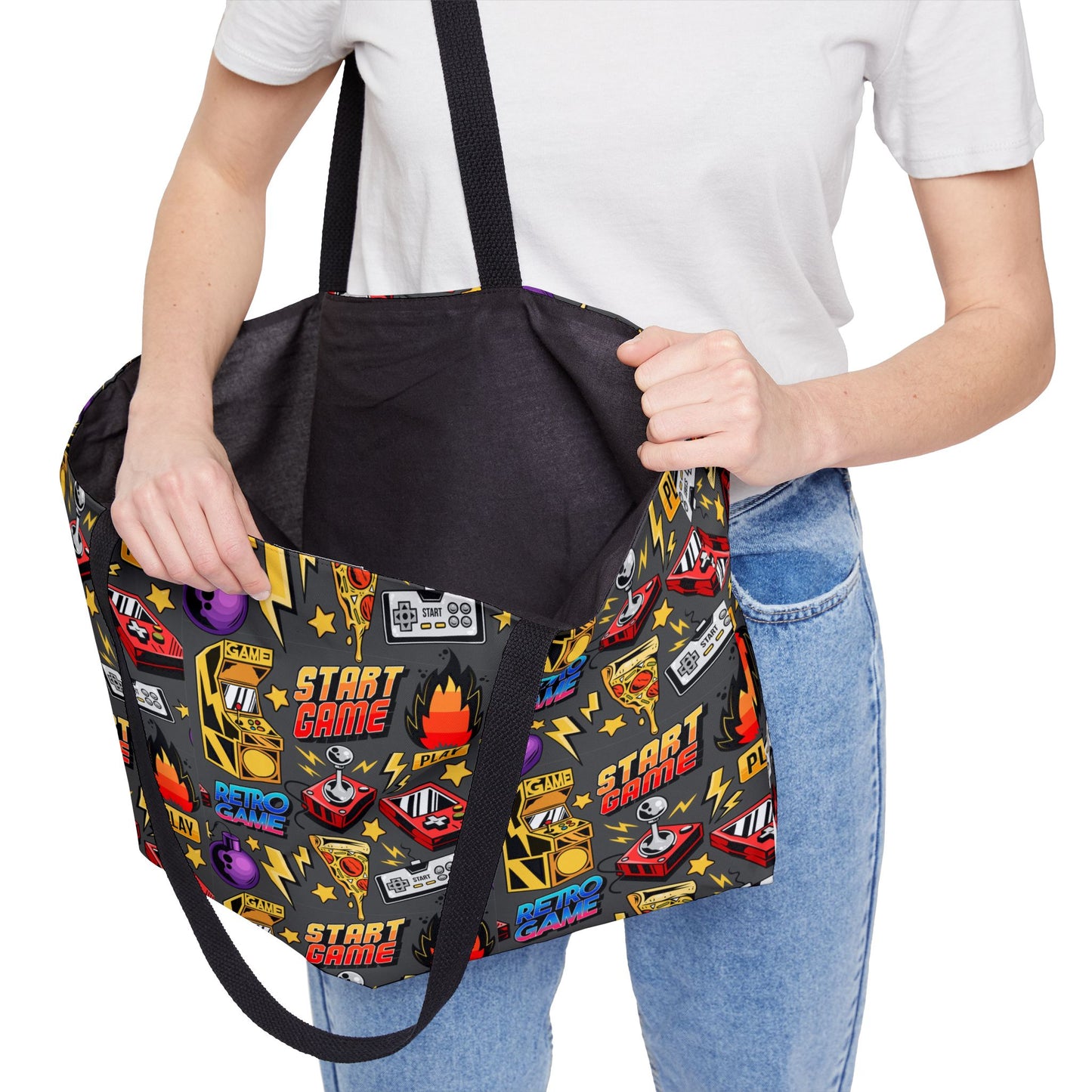 Close-up of Gamer Weekender Tote Bag held by hand highlighting strap and interior
