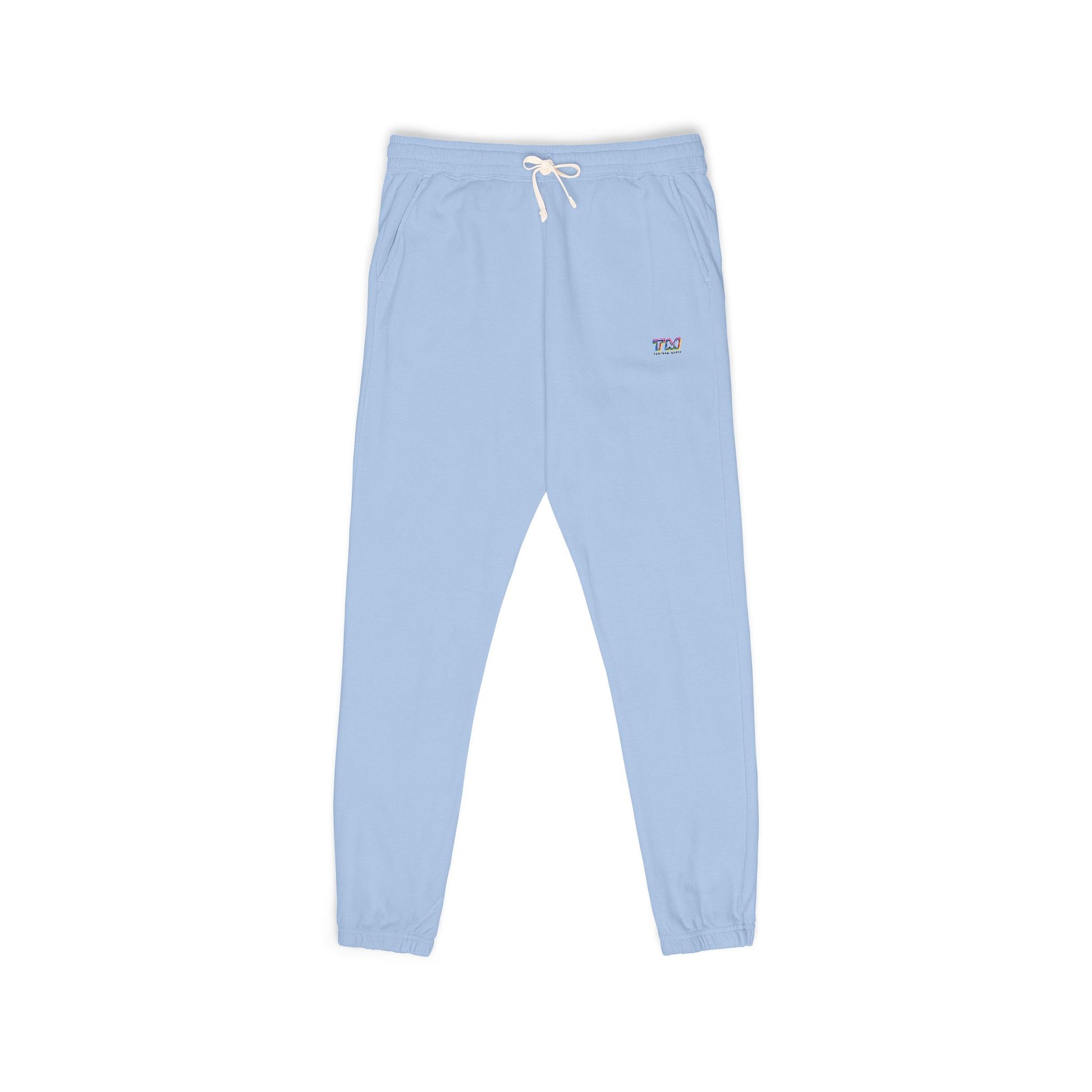 Light blue Tantrum Media Cozy Fleece Sweatpants with elastic waistband and logo