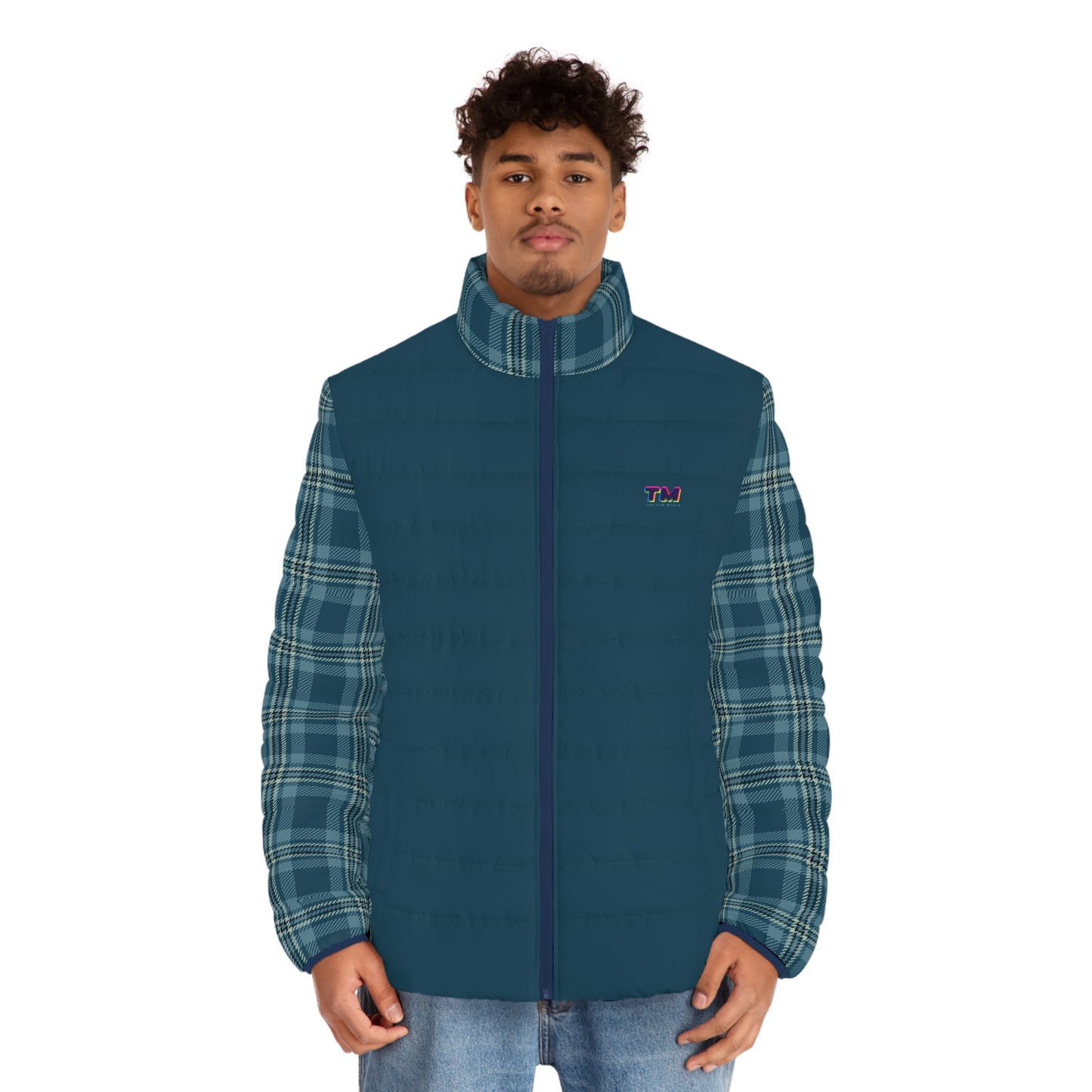 Man wearing a blue vest with plaid sleeves on a white background