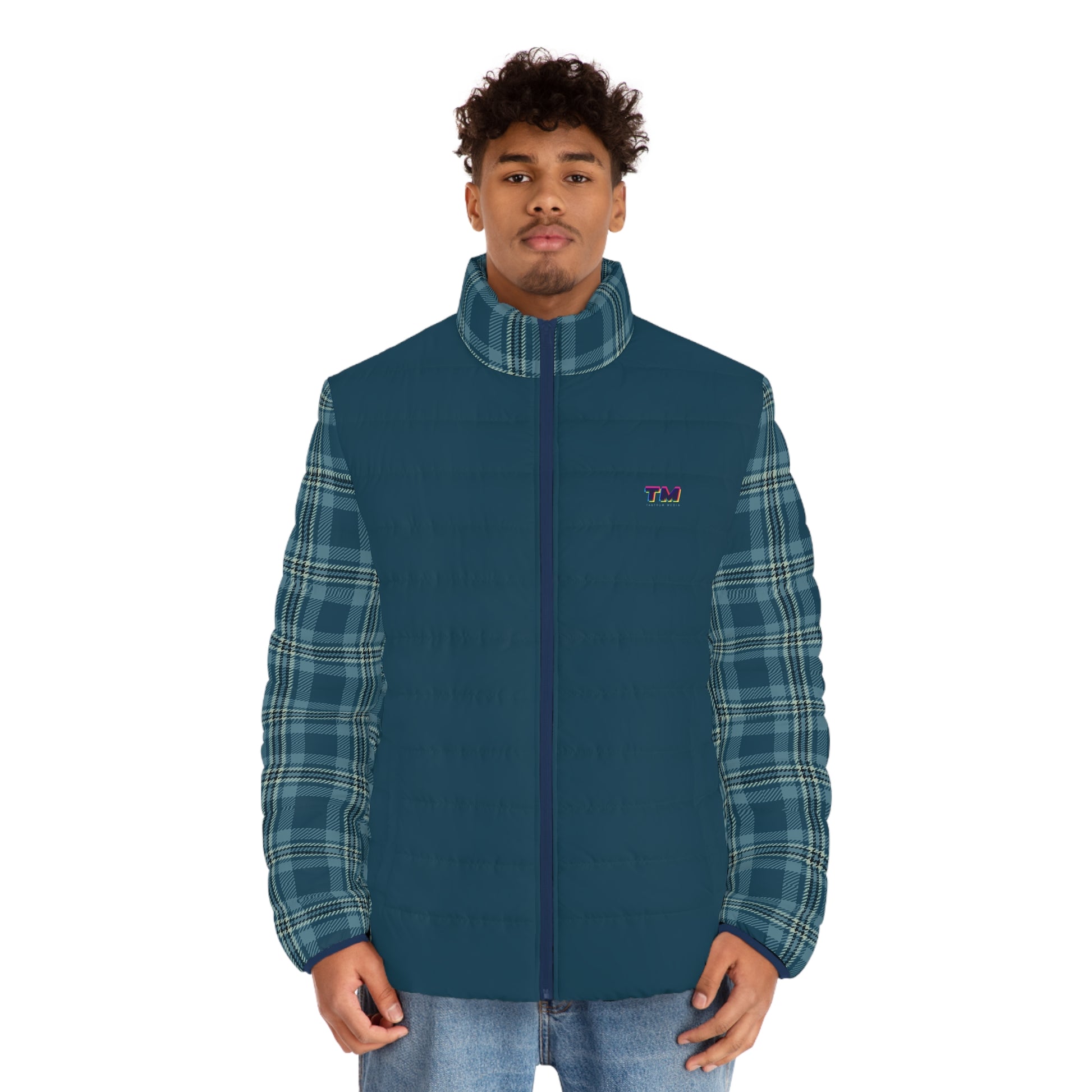 Man wearing a blue vest with plaid sleeves on a white background