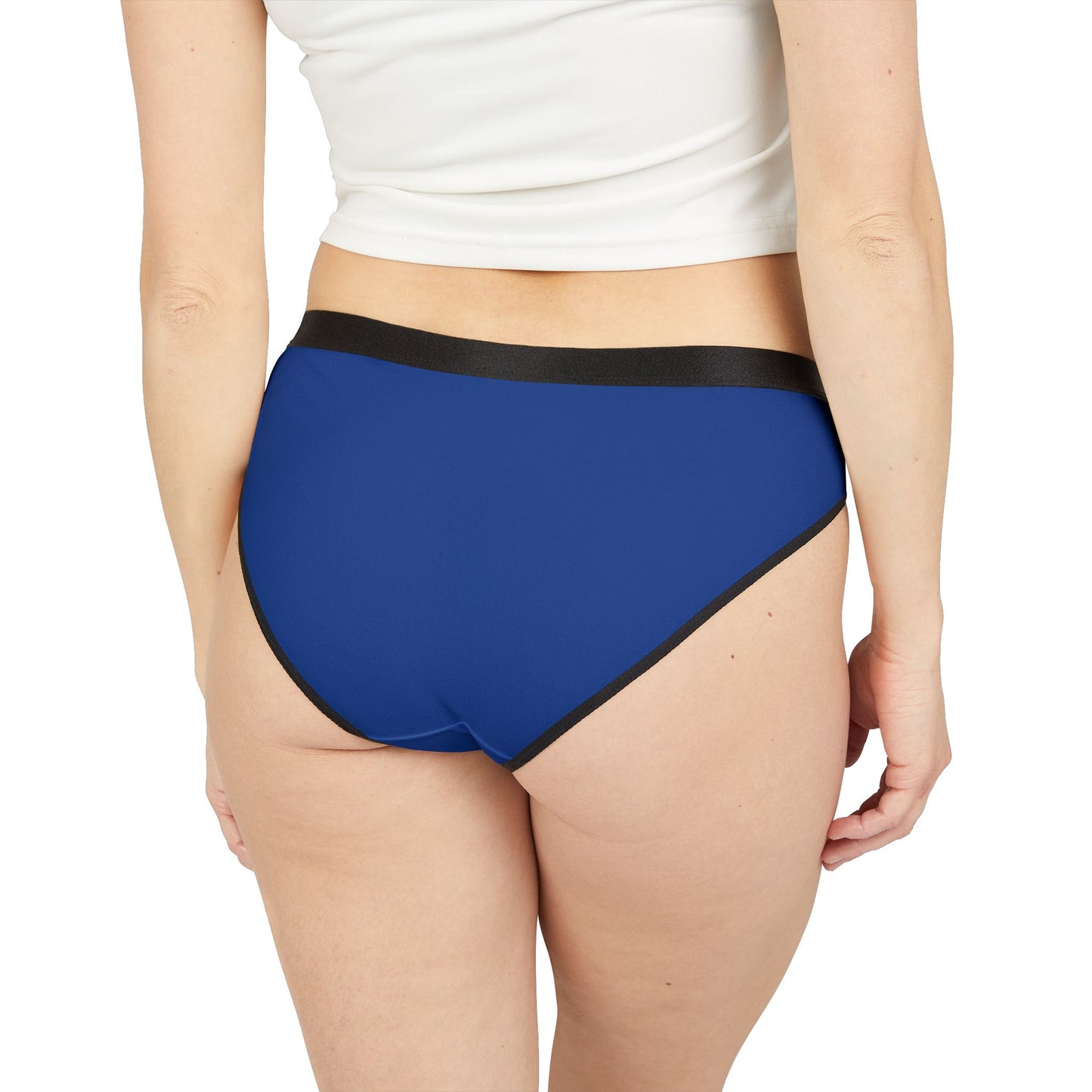 Model wearing Friday Panty Blue back view showing solid blue fabric with black waistband