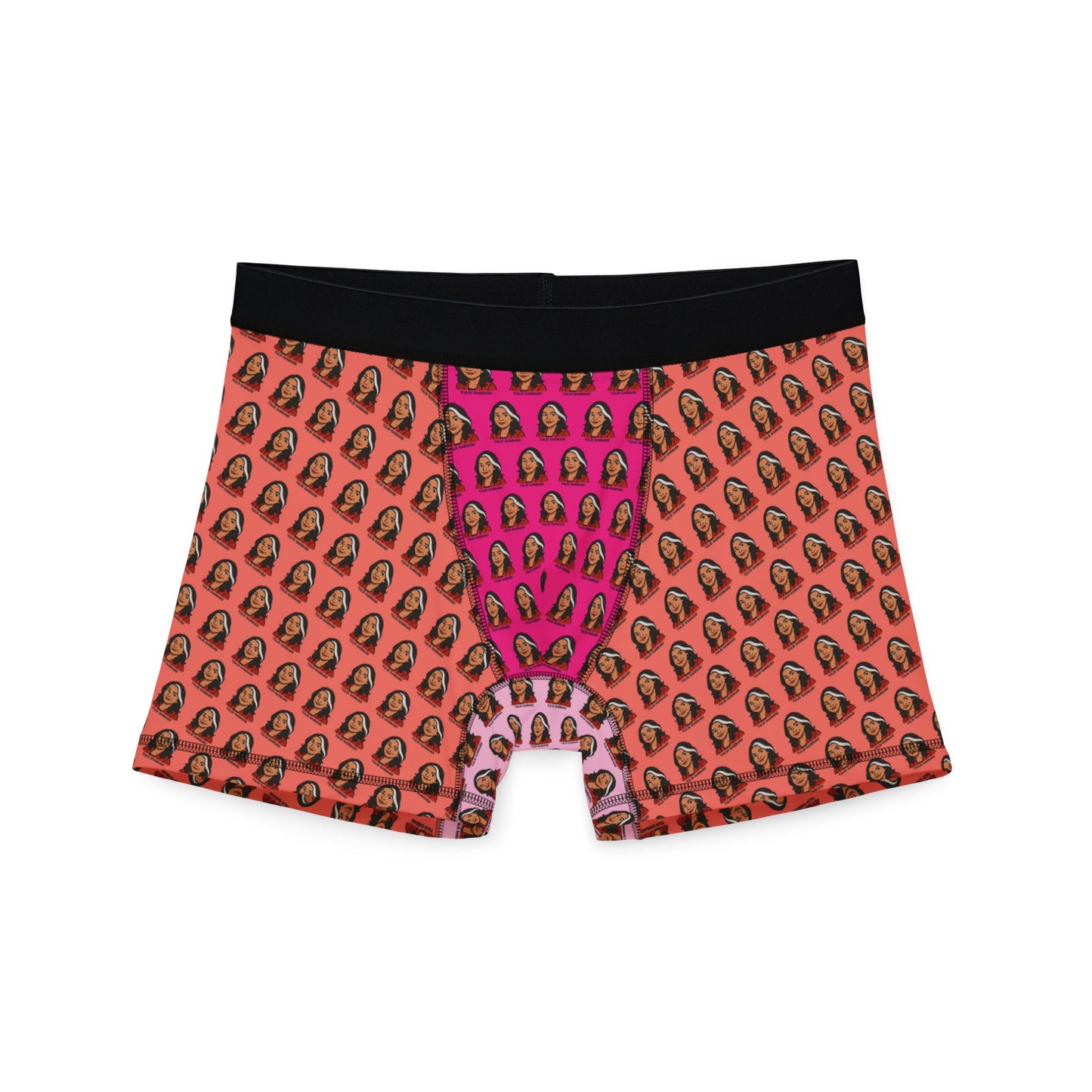 Flat lay of Tulsi Gabbard boxer briefs with face print on pink and orange gradient, black waistband