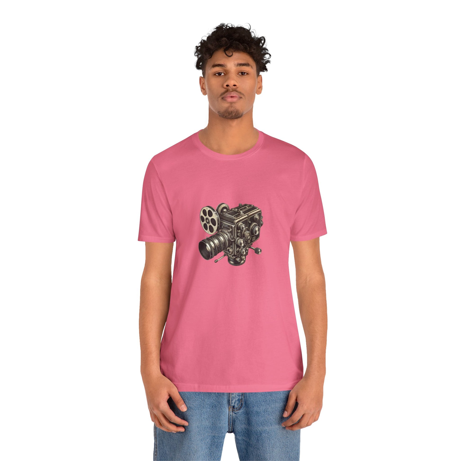 Man wearing bright pink t-shirt with vintage 16mm camera design