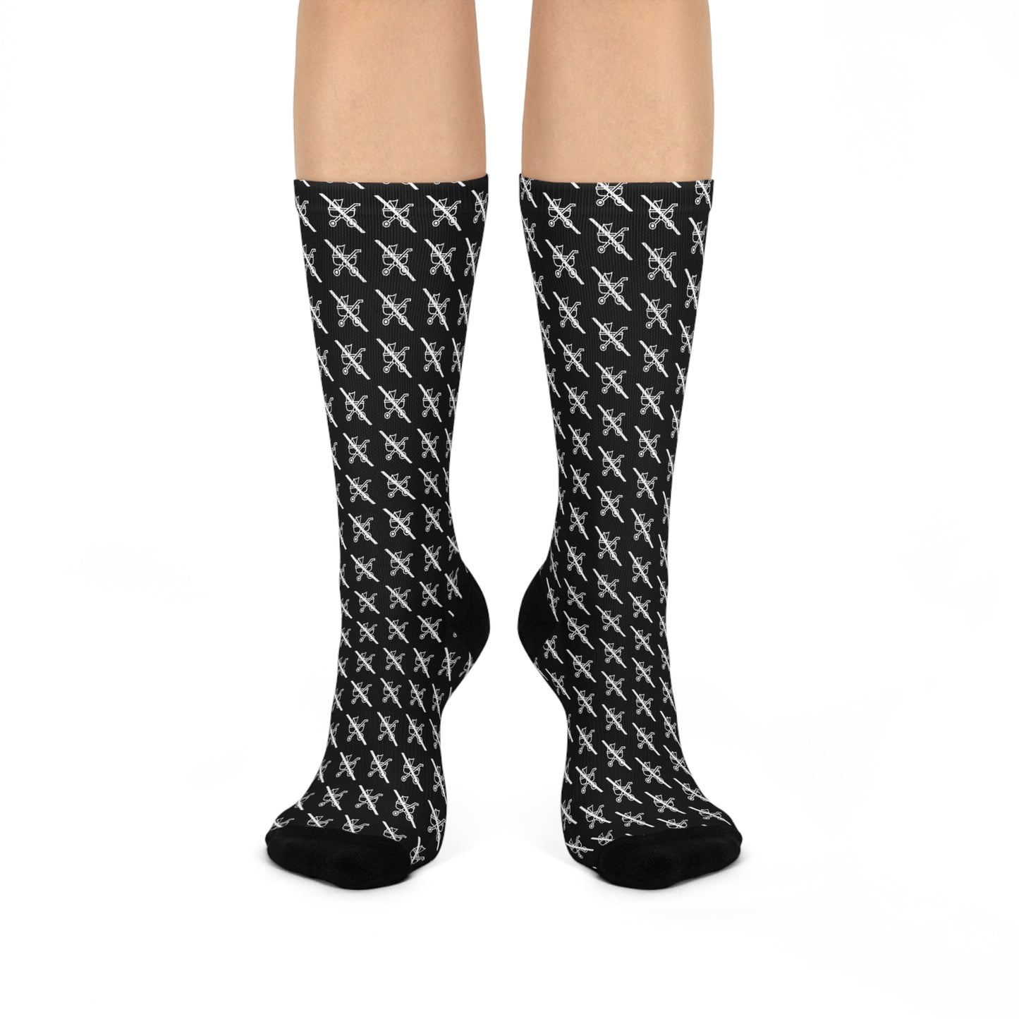 Pair of black Proudly Childless crew socks shown on legs standing straight