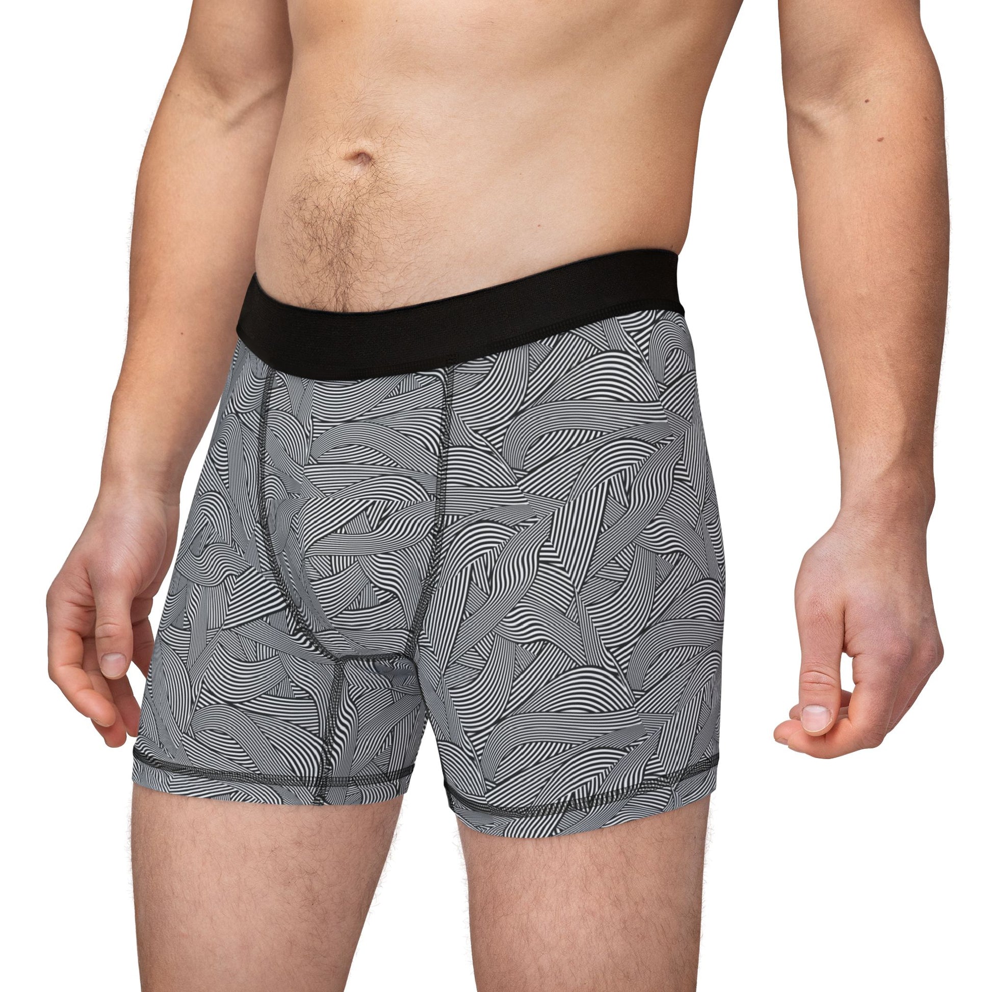 Side angle of Waves Men’s Boxers with contoured fit, black waistband, and gray wave fabric design