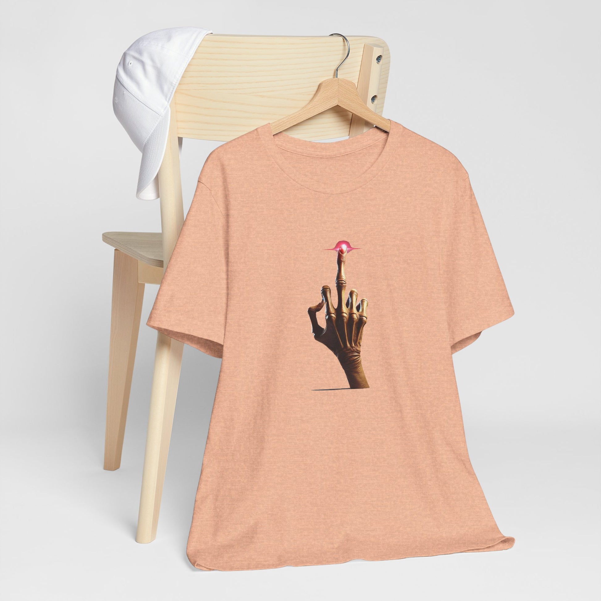 Peach E.T Unisex T-Shirt styled with casual accessories