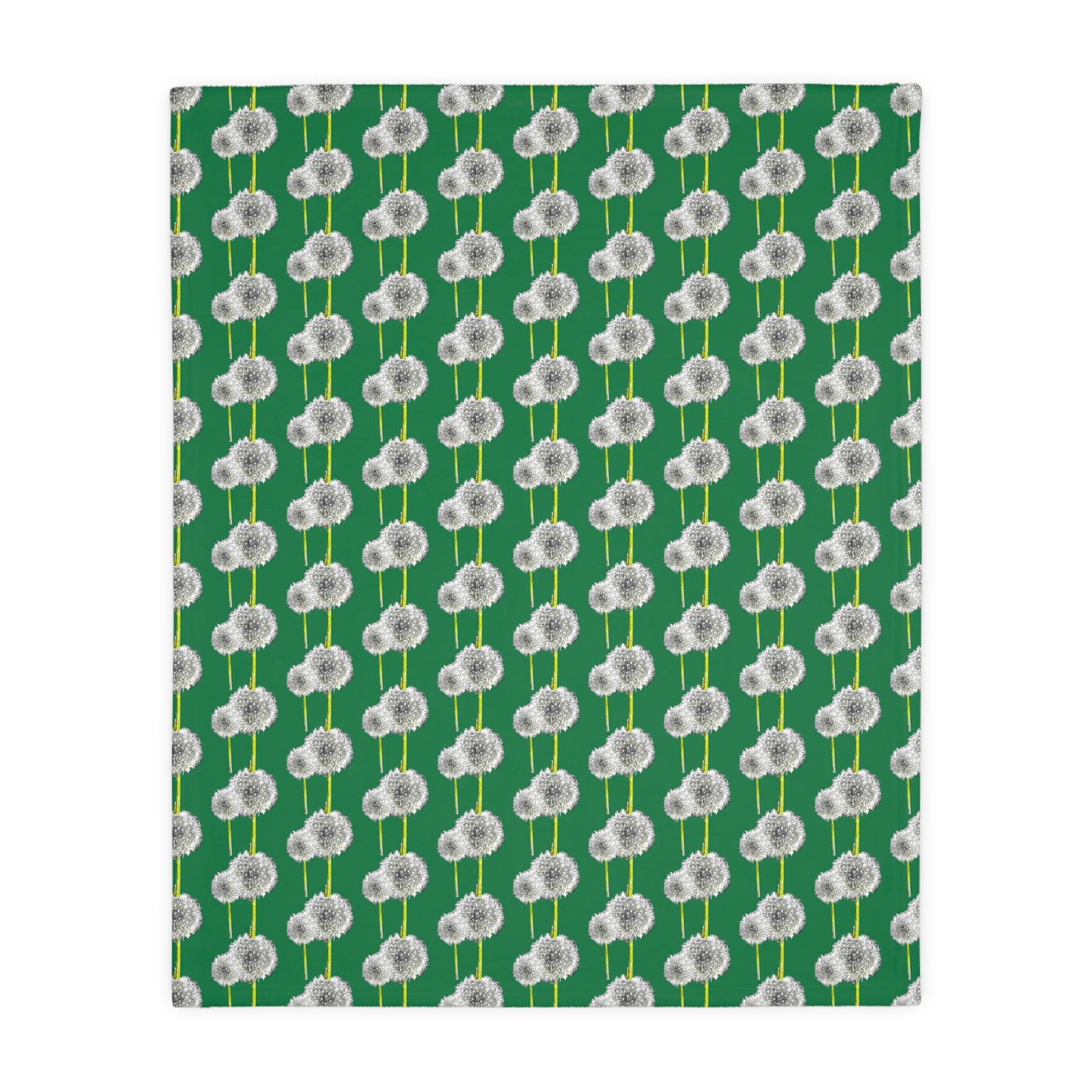 Flat view of green blanket decorated with white dandelion design