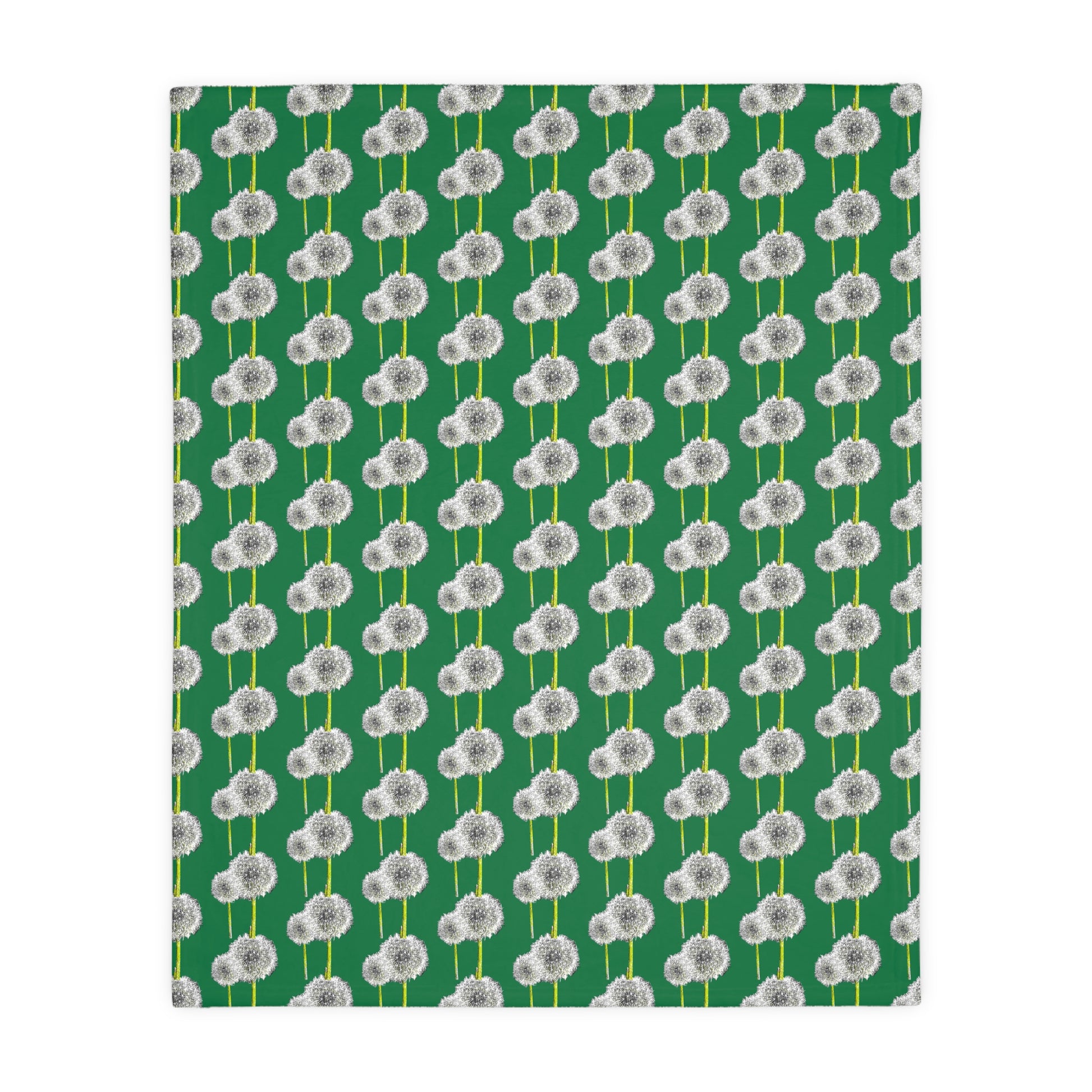 Flat view of green blanket decorated with white dandelion design