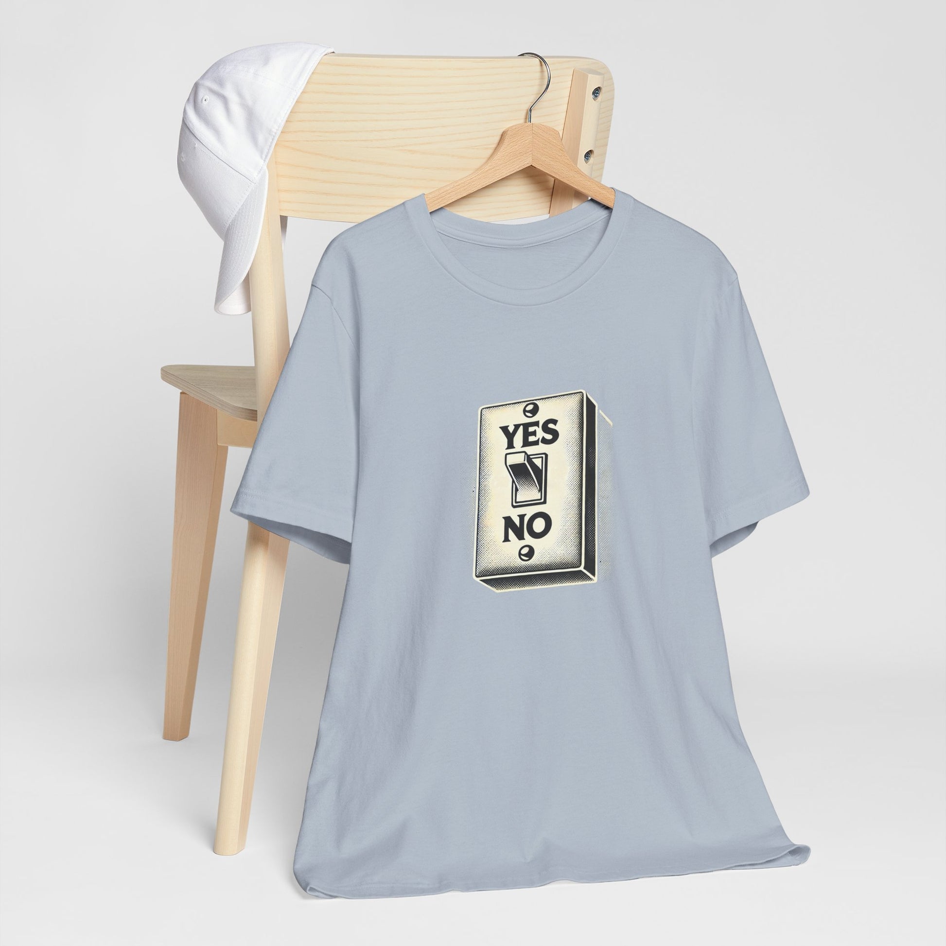 Flat lay of blue YES/NO Switch Tee on hanger