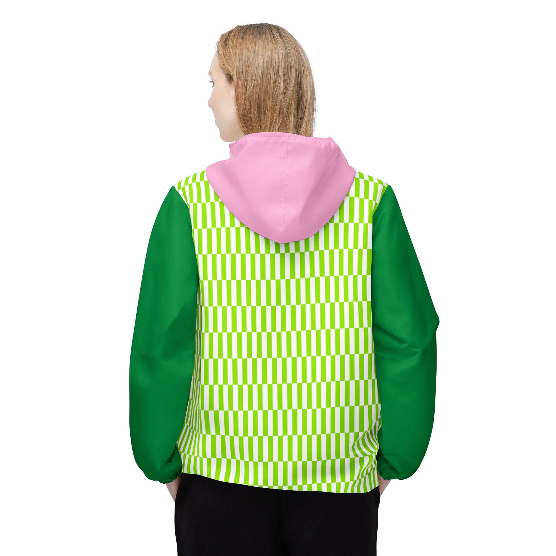 Woman wearing Fresh Vibes Windbreaker back view showing pink hood and geometric green design.