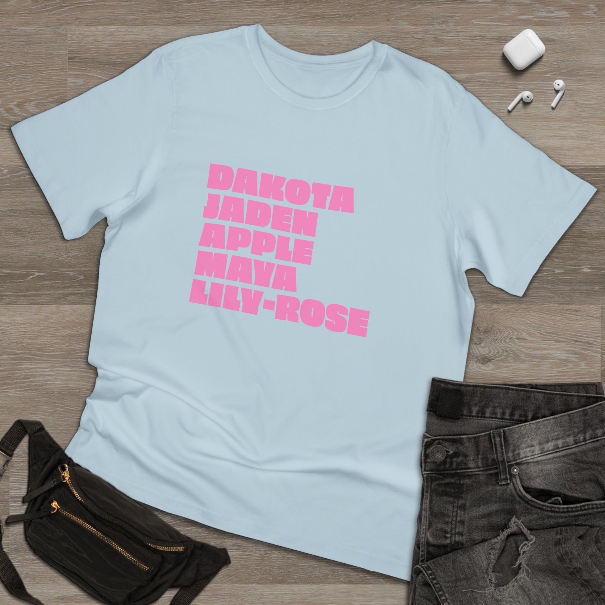 Light blue Nepo Babies List T-Shirt with pink lettering flat lay