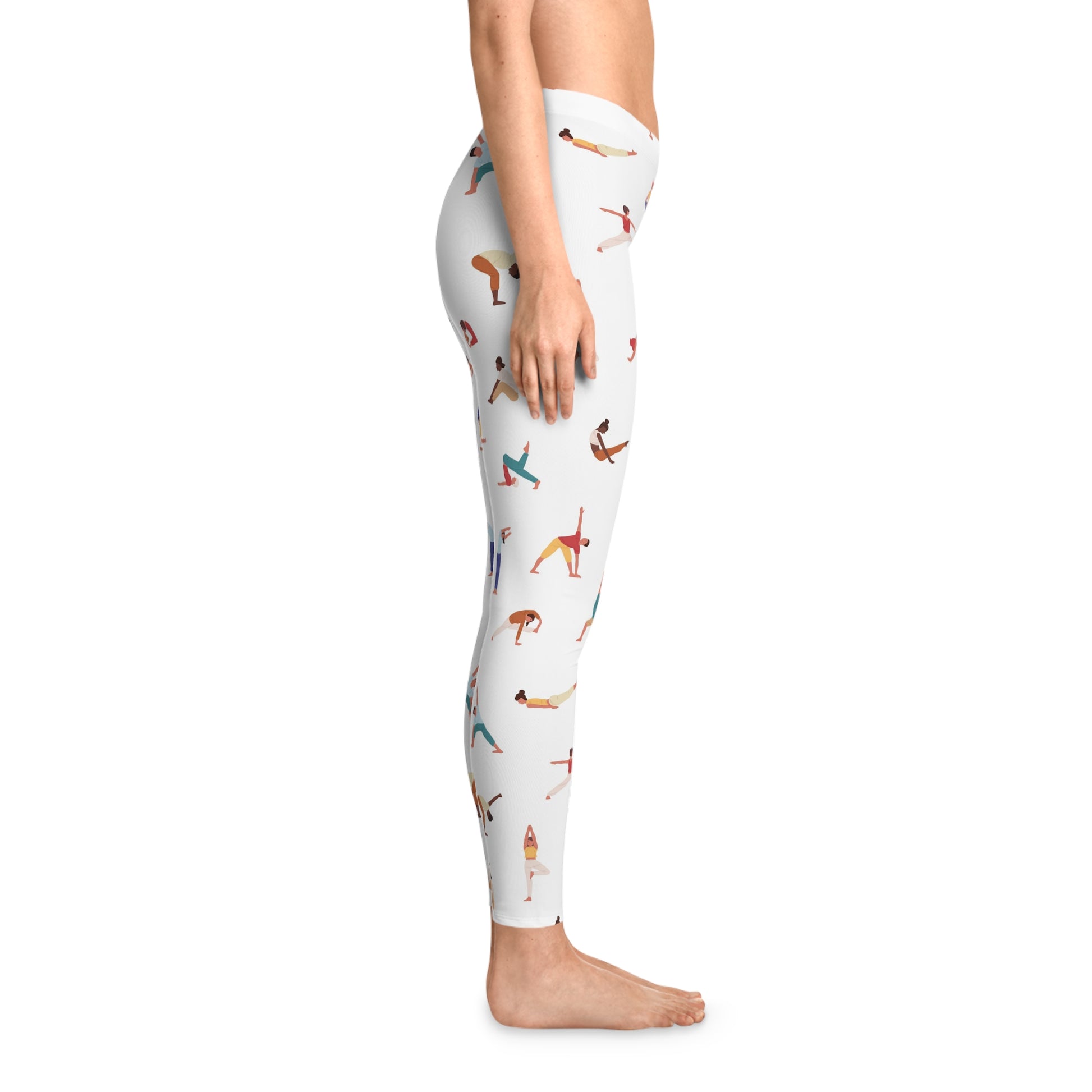 Model wearing Yogini Leggings in white with yoga illustrations, side view.