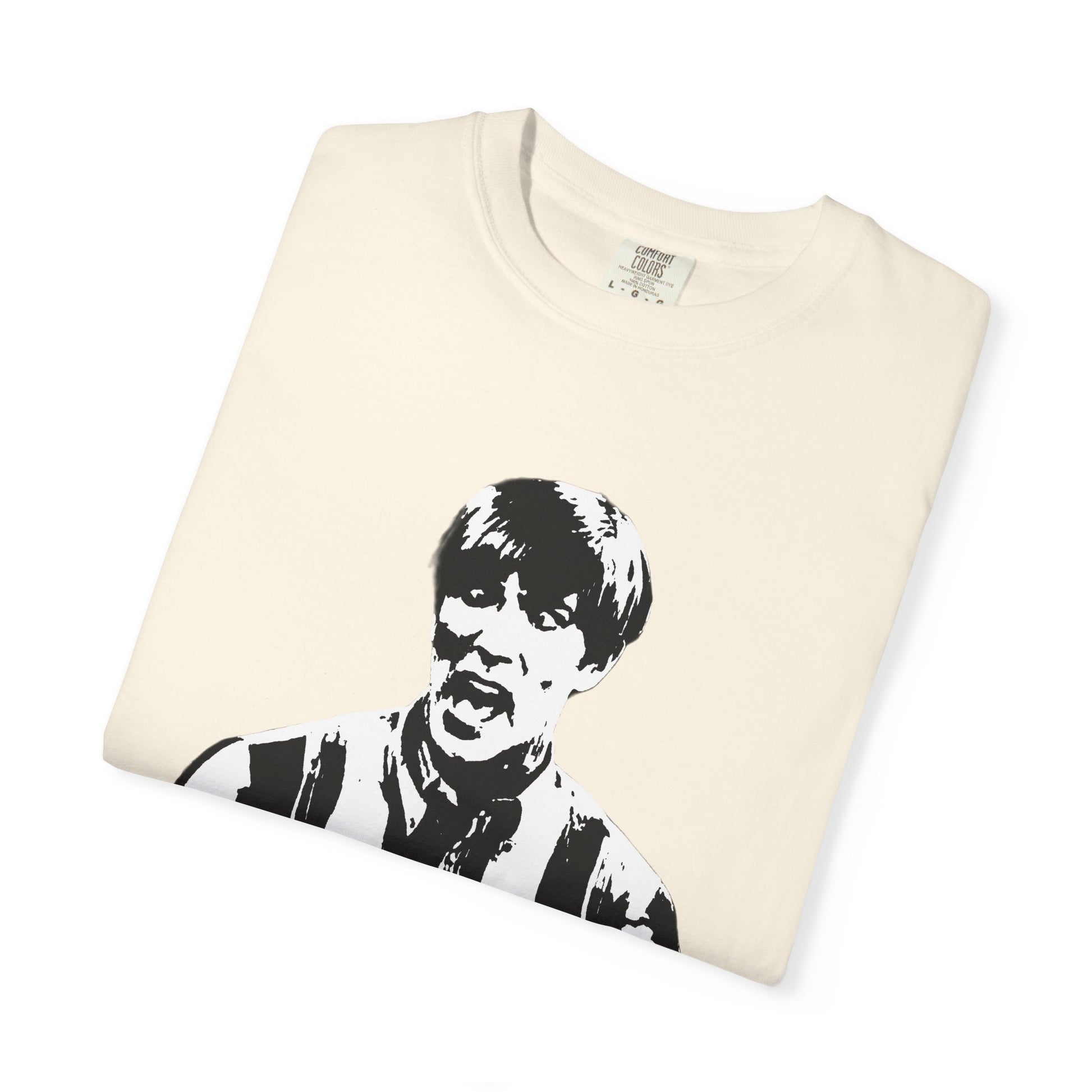 Beige Stuart MadTV T-shirt folded flat featuring black stencil-style character design.