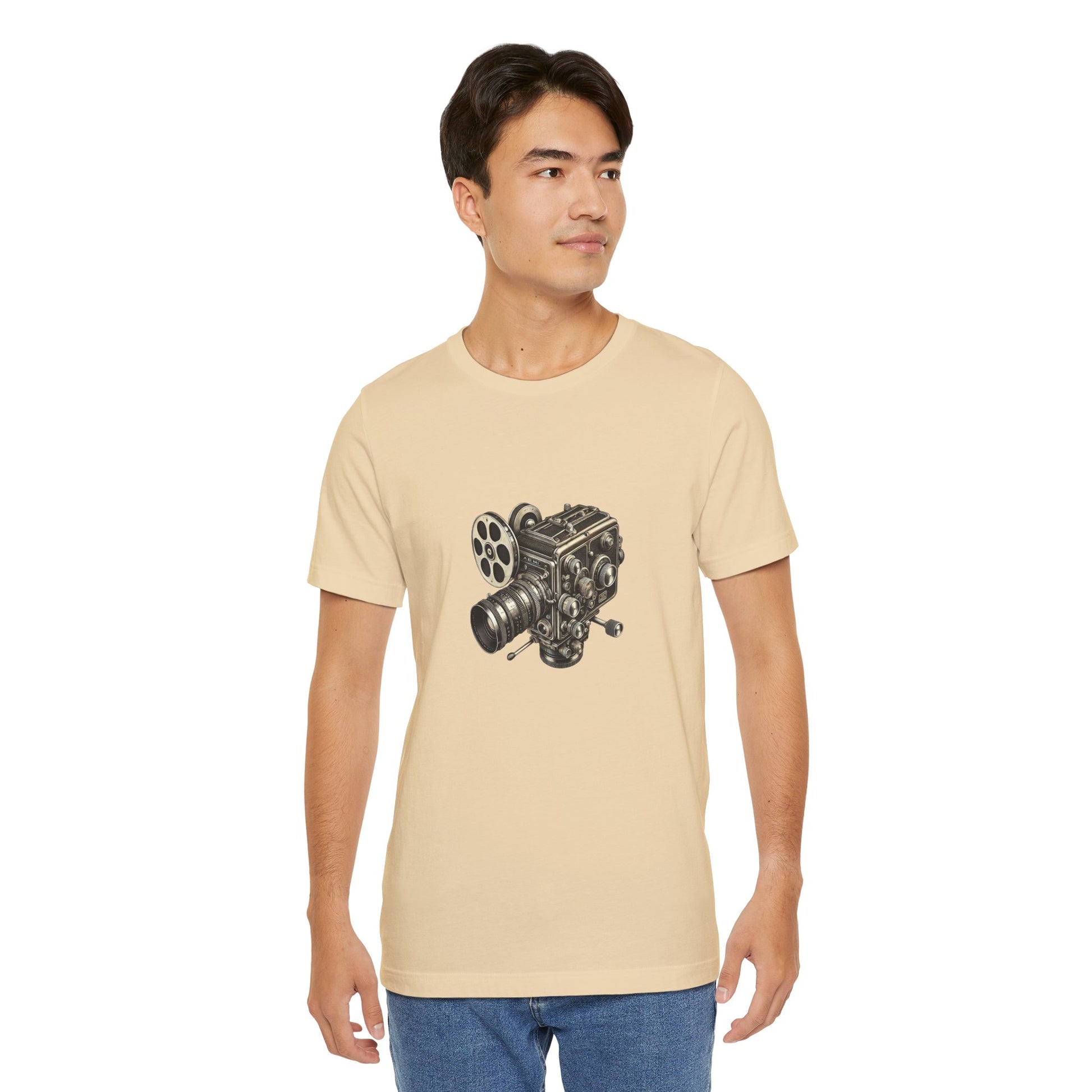 Man wearing beige t-shirt with vintage 16mm camera design