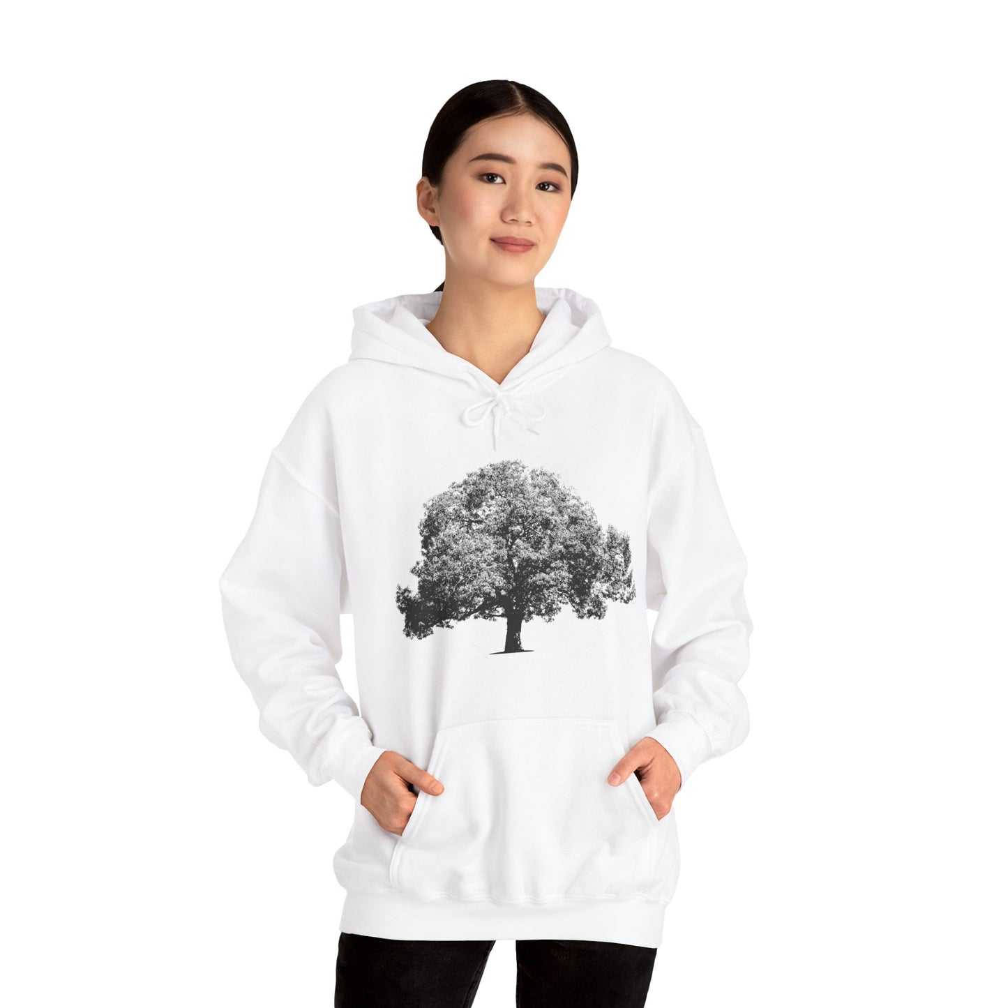 Woman wearing white Tree Hoodie with black tree graphic