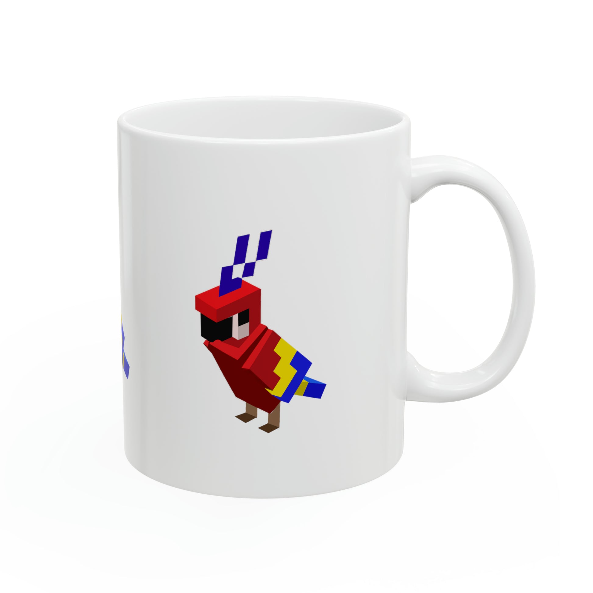 Angled view of white mug with colorful 8-bit parrot graphic printed on the side.