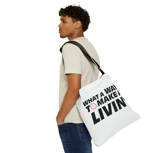 Man carrying a white tote bag featuring bold black text "WHAT A WAY TO MAKE A LIVIN'" with a small clock graphic