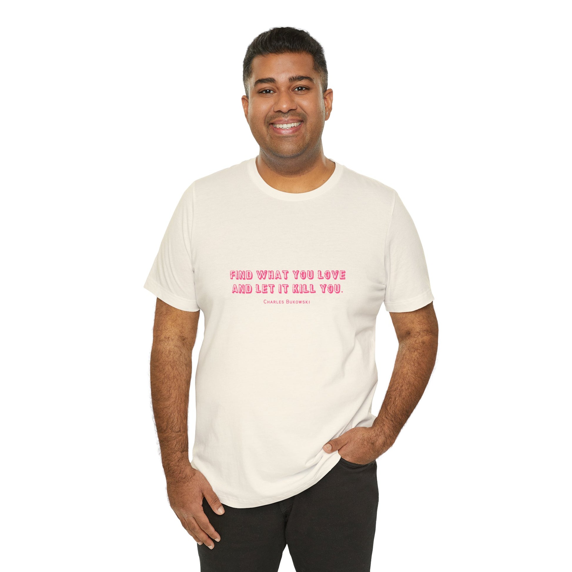 Man wearing a white Bukowski quote t-shirt with jeans.