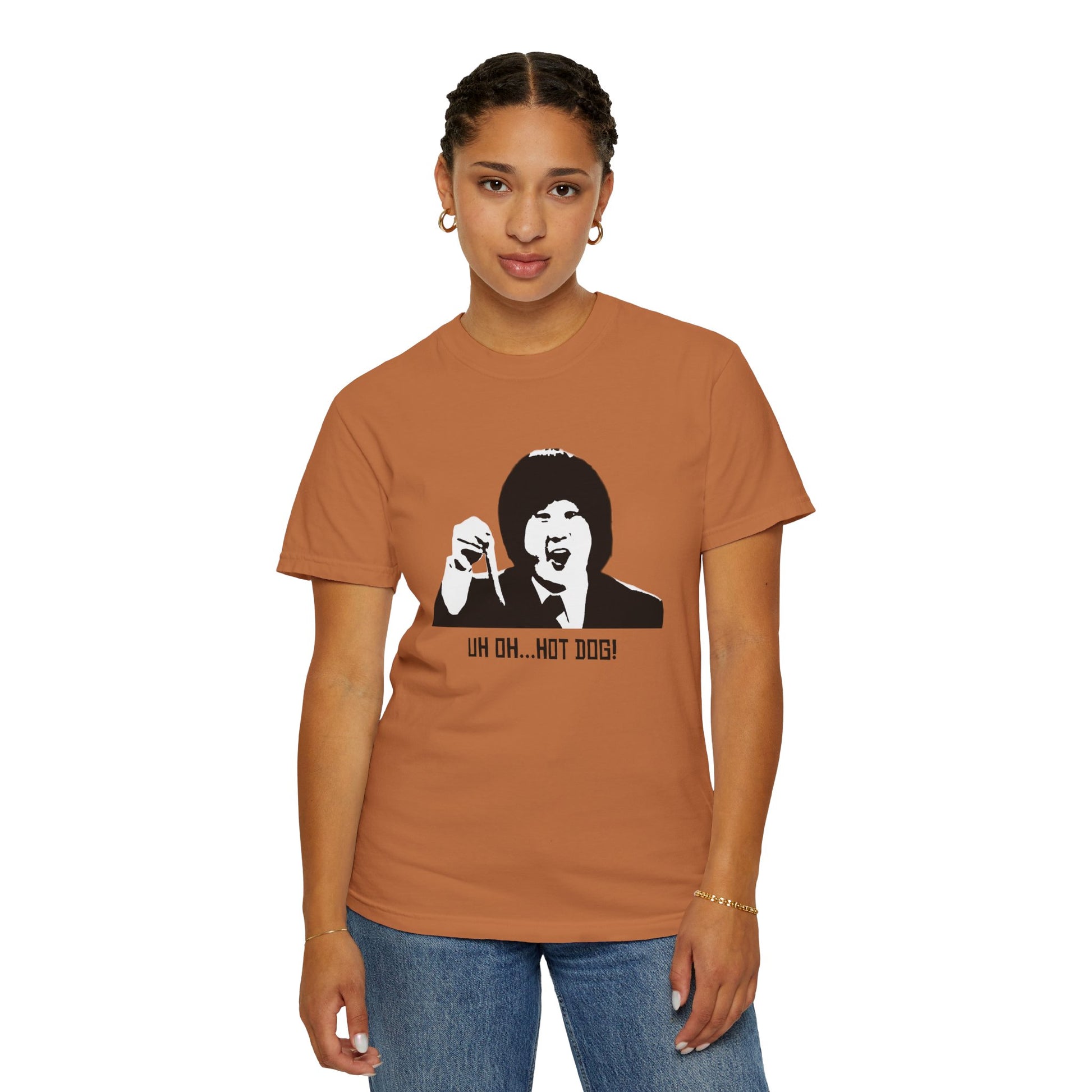 Woman modeling rust orange Uh Oh Hot Dog T-shirt with Bobby Lee quote.
