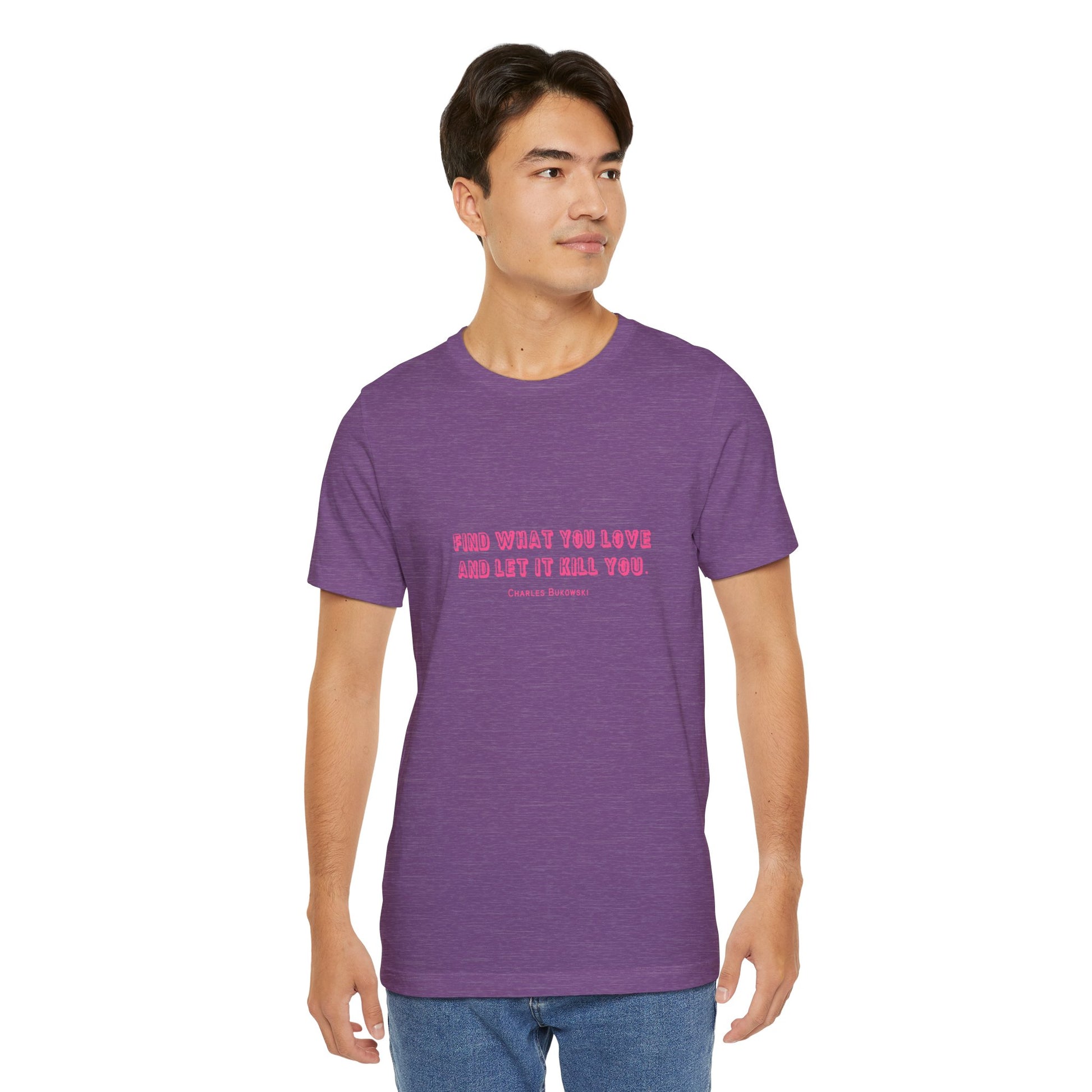 Man wearing a purple Bukowski quote t-shirt with jeans.
