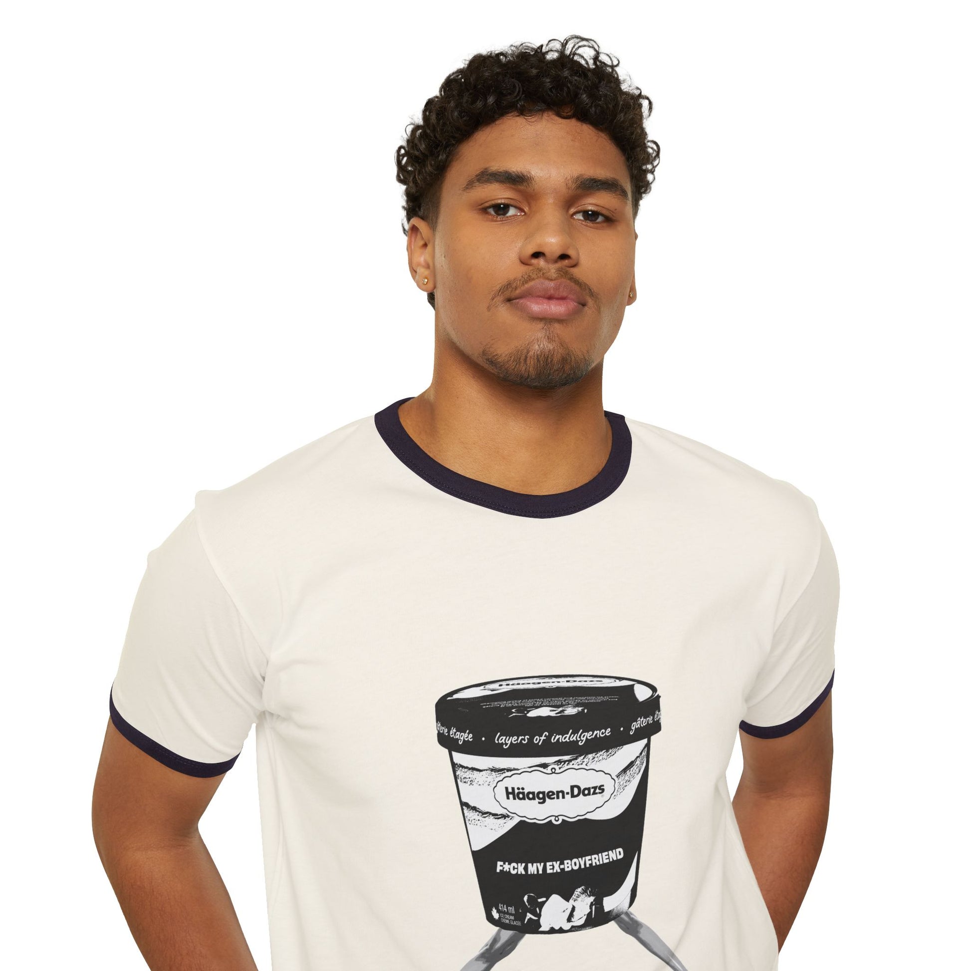 Man wearing cream ringer t-shirt with black ice cream breakup graphic and black collar