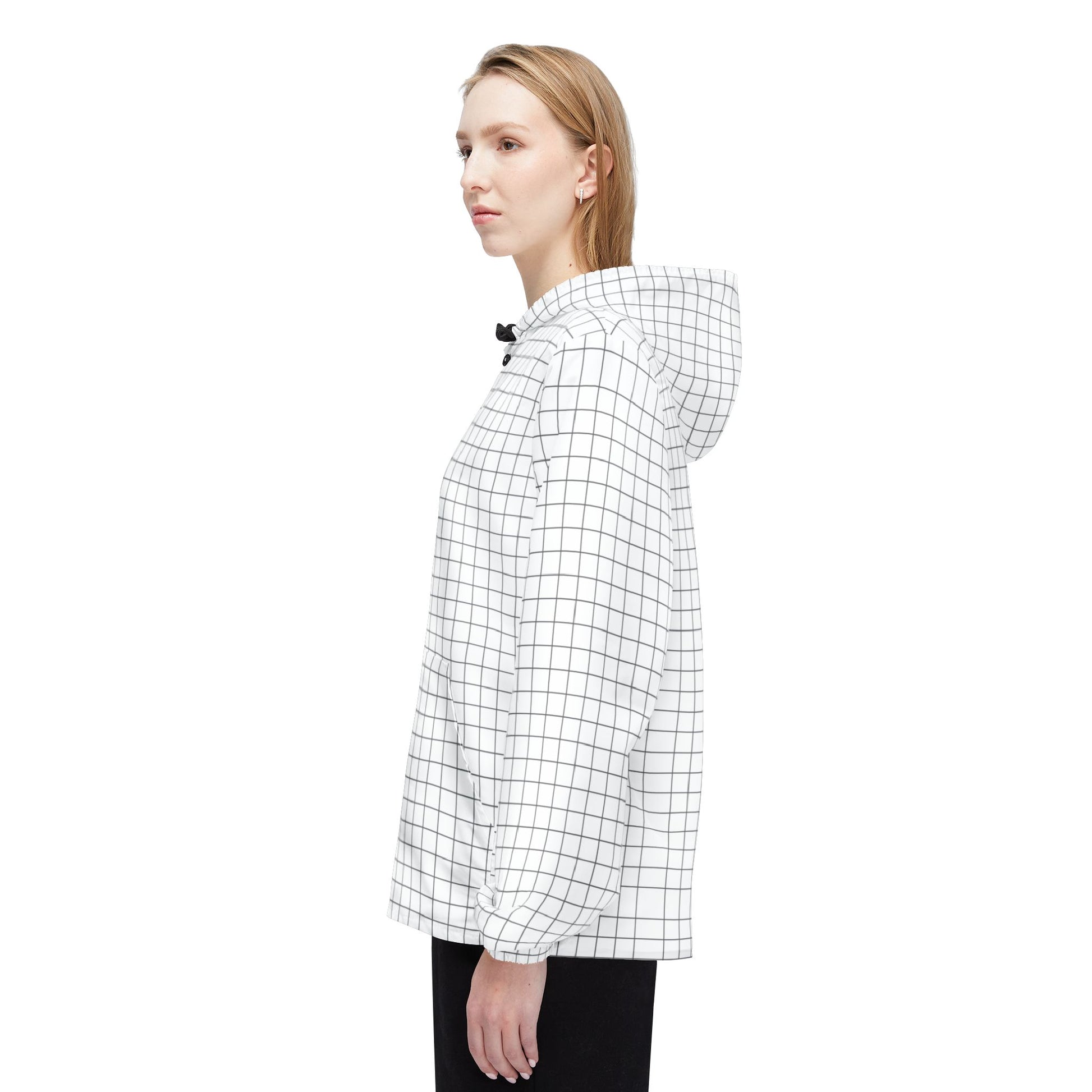 Female model side view in Grid Windbreaker Jacket with hood down.
