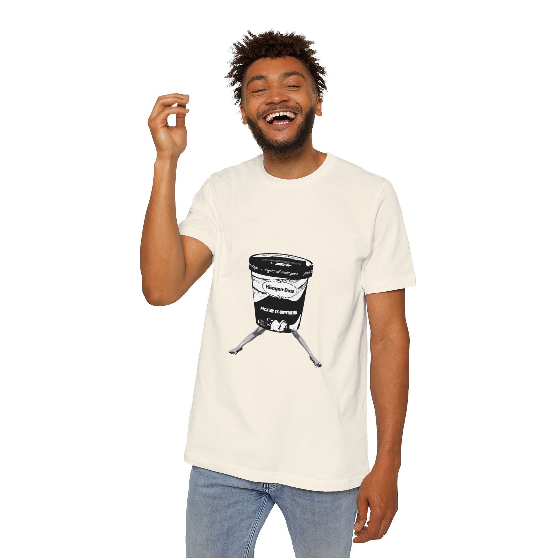 Man smiling in cream t-shirt with crossed-leg ice cream graphic and bold text
