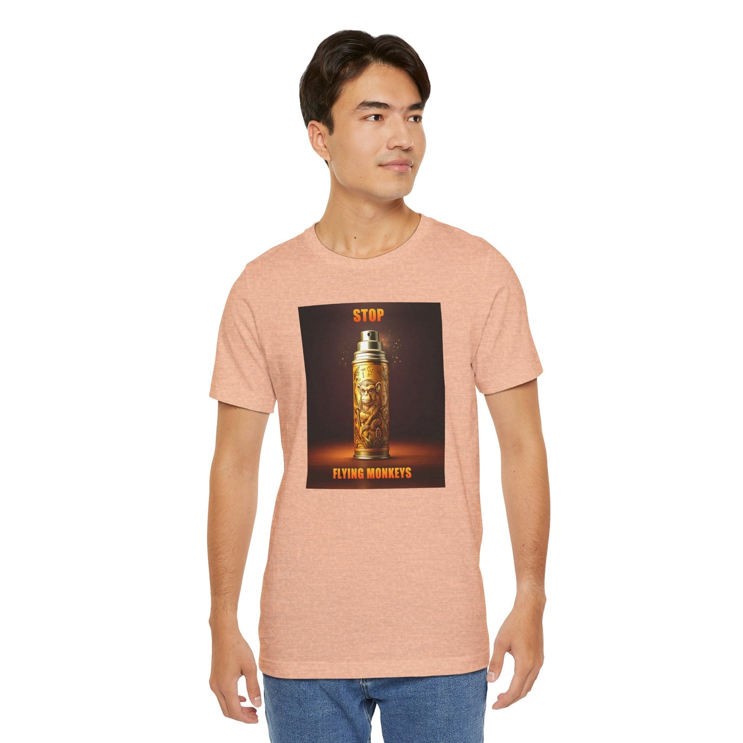Man in peach Stop Flying Monkeys T-Shirt standing casually