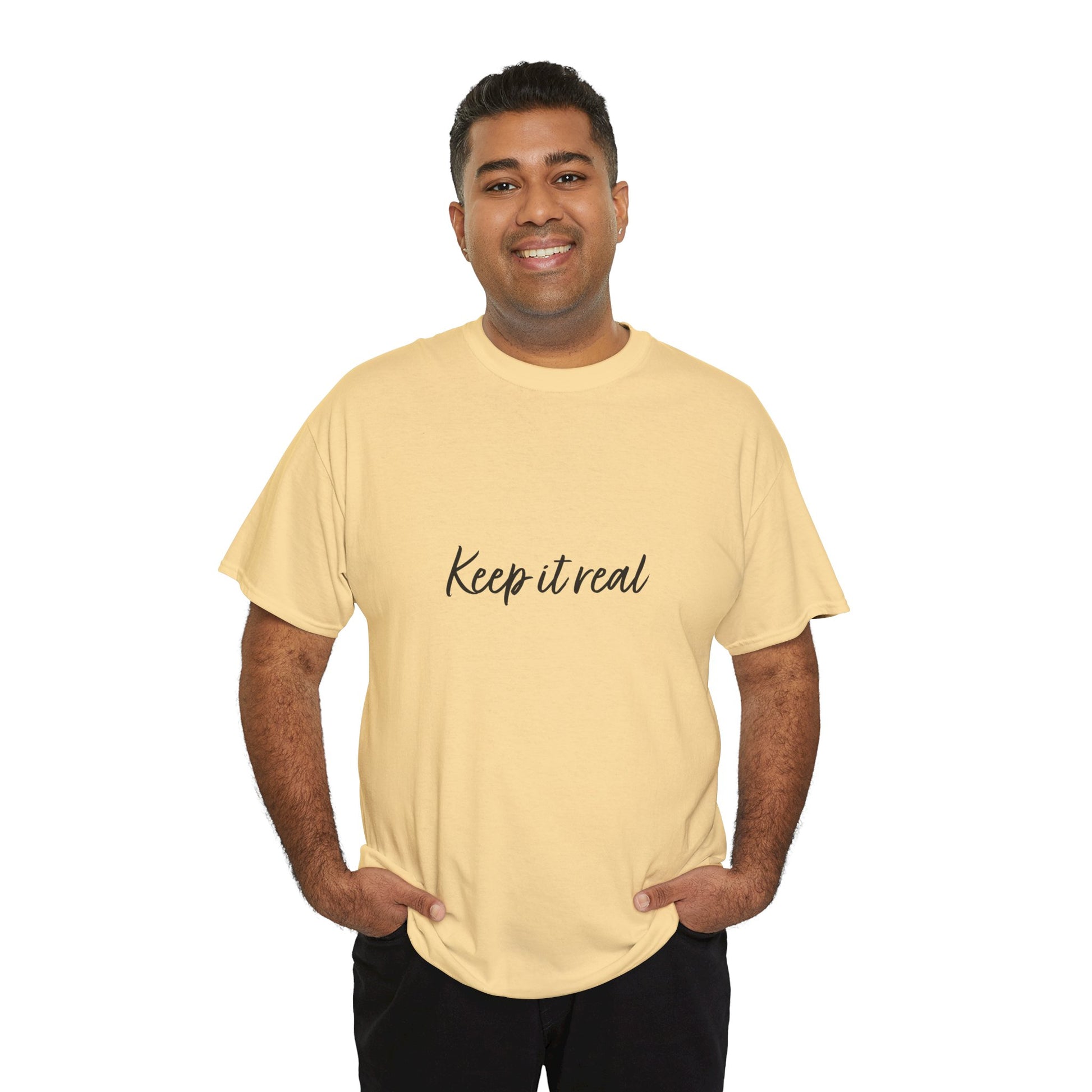 Man wearing yellow Keep it real T-Shirt smiling