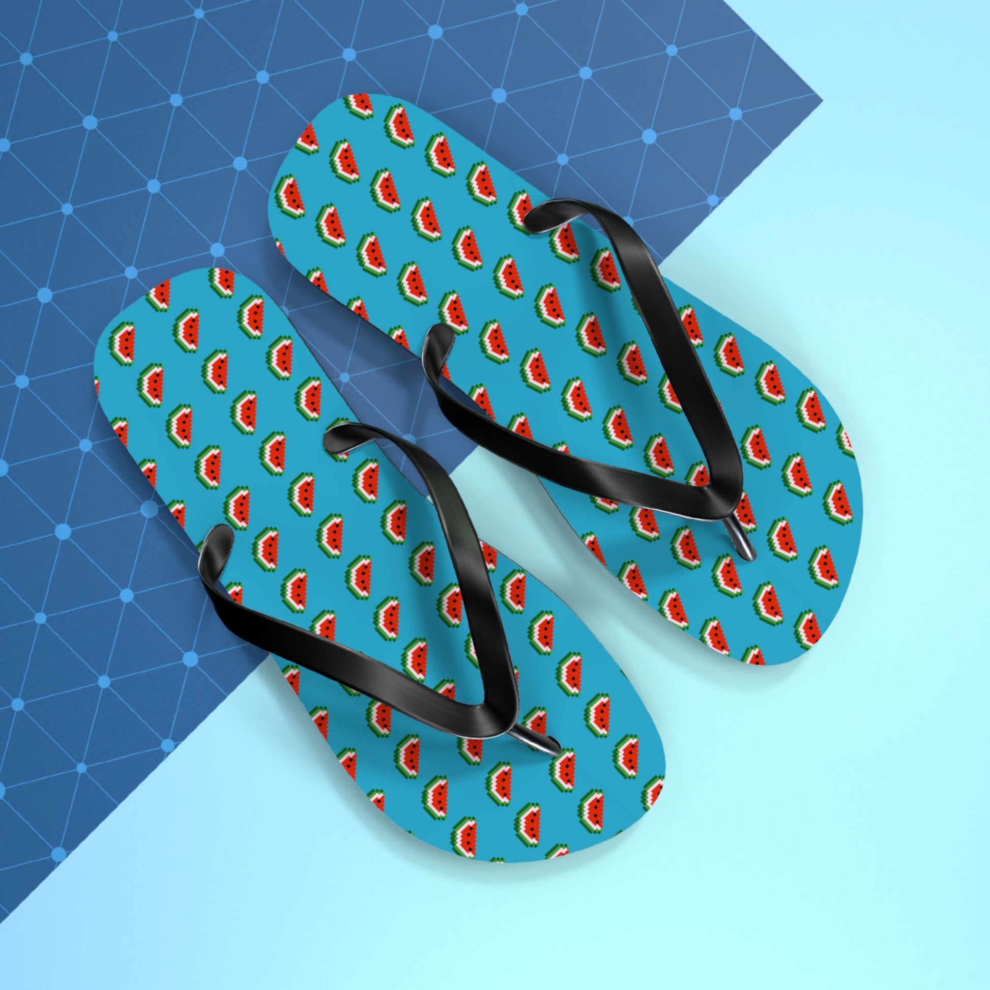 Flip-flops with watermelon pattern on a blue and gray geometric background
