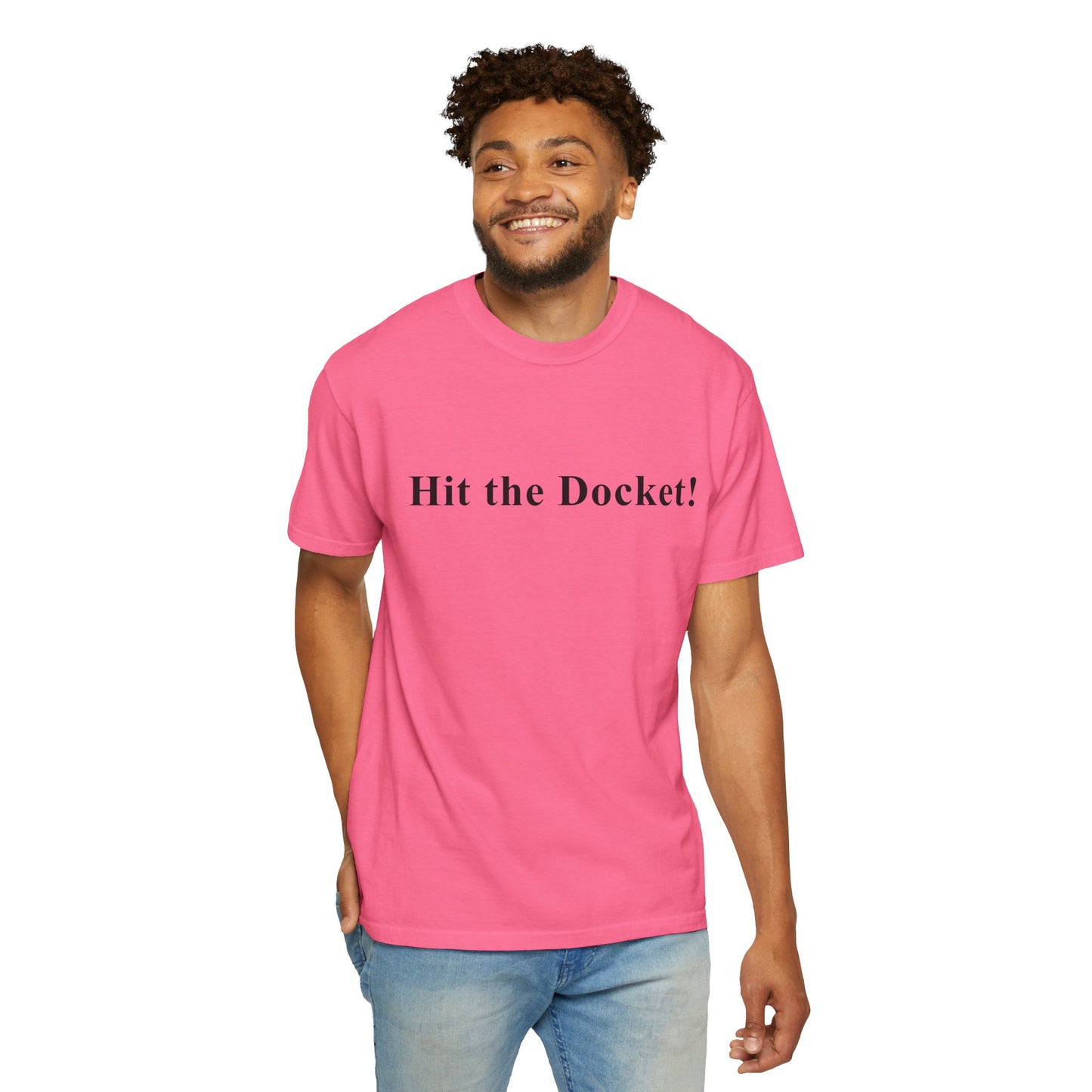 Man wearing a pink t-shirt with 'Hit the Docket!' text on a white background