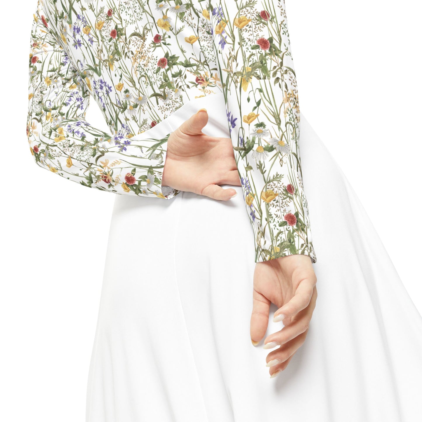 Close-up of the Wildflower Bloom Long Sleeve Midi Dress showing the floral sleeve and waist seam detail.