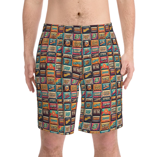 Men's beach shorts featuring a seamless, all-over pattern of colorful, retro-inspired imaginary candy wrappers. The shorts are fun, bold, and designed with a playful mix of vibrant colors and varied candy packaging designs.