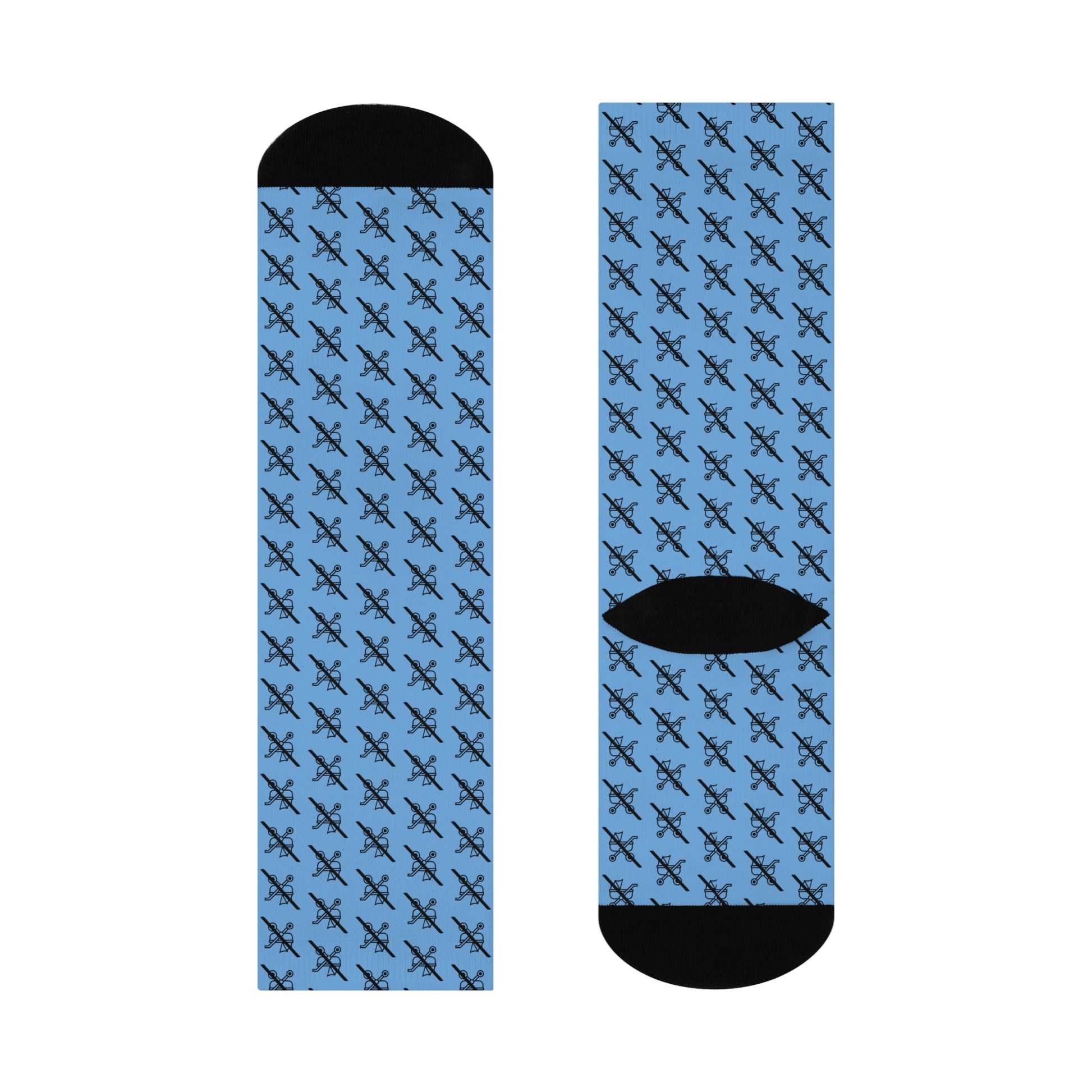 Flat lay of single blue Proudly Childless crew sock front and back with black accents