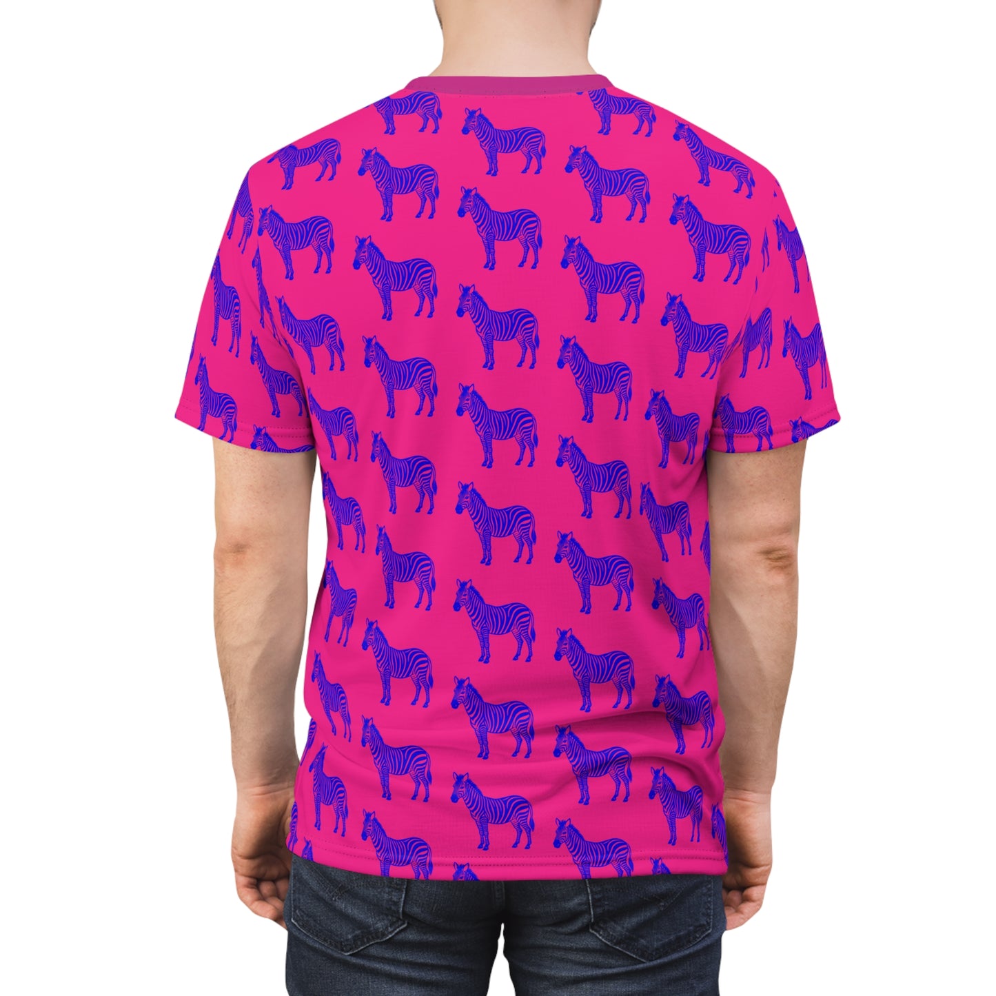 Back view of man wearing Blue Zebra Unisex T-Shirt, showing pink fabric with blue zebra pattern.