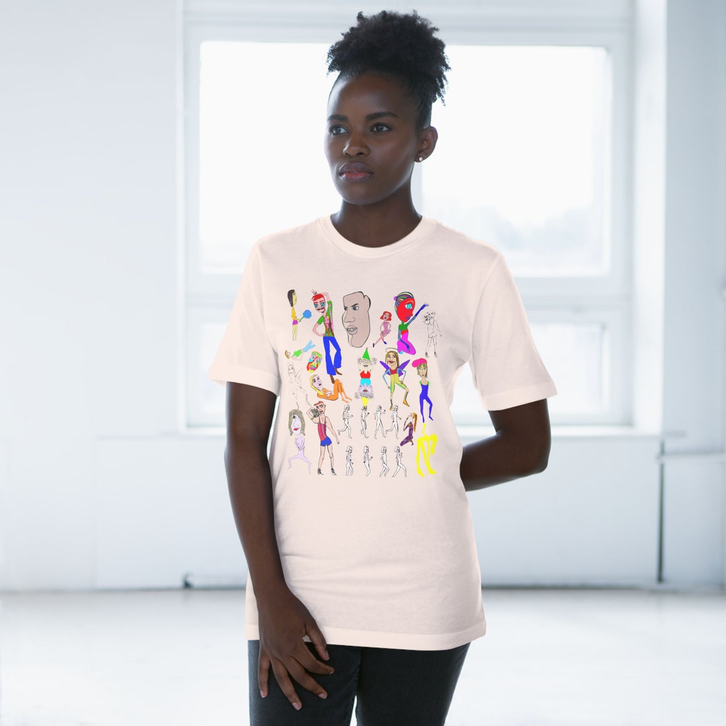 Female model wearing peach Mix Unisex Deluxe T-Shirt with colorful hand drawn design.