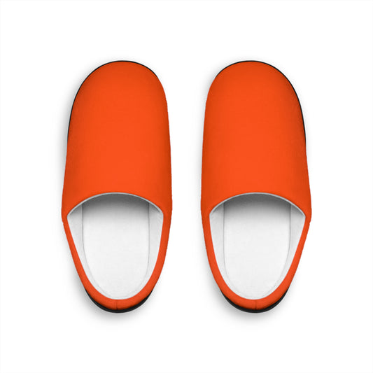 Bright orange indoor slippers with white cushioned interior