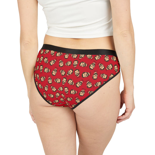 Back view of a woman wearing J.D. Vance Panties featuring a repeating cartoon face pattern on red fabric.